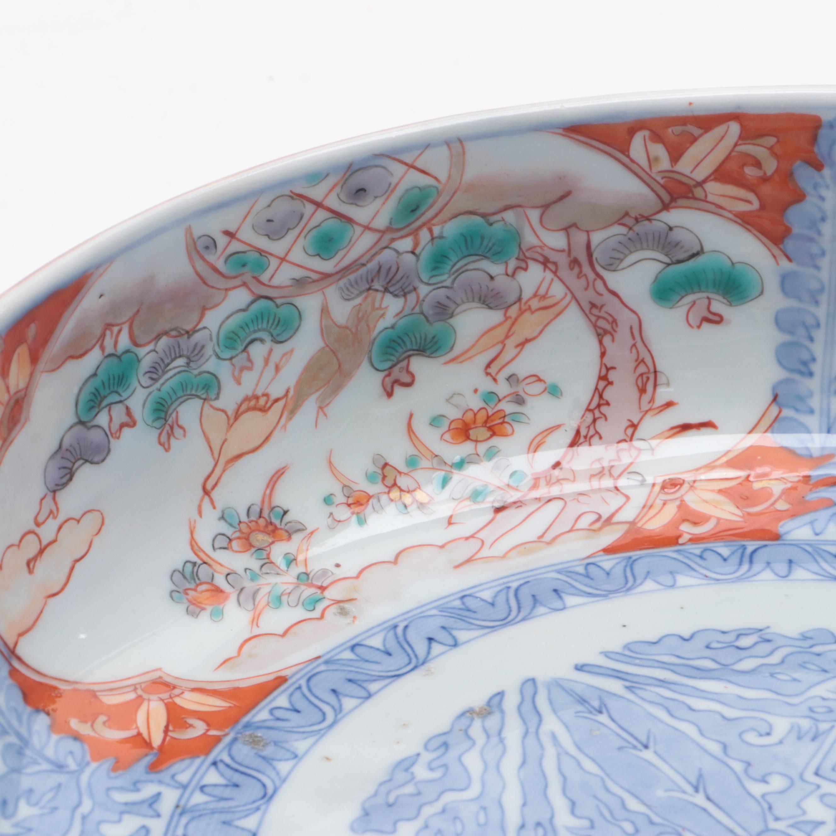 Japanese Imari Porcelain Bowl with Carved Stand