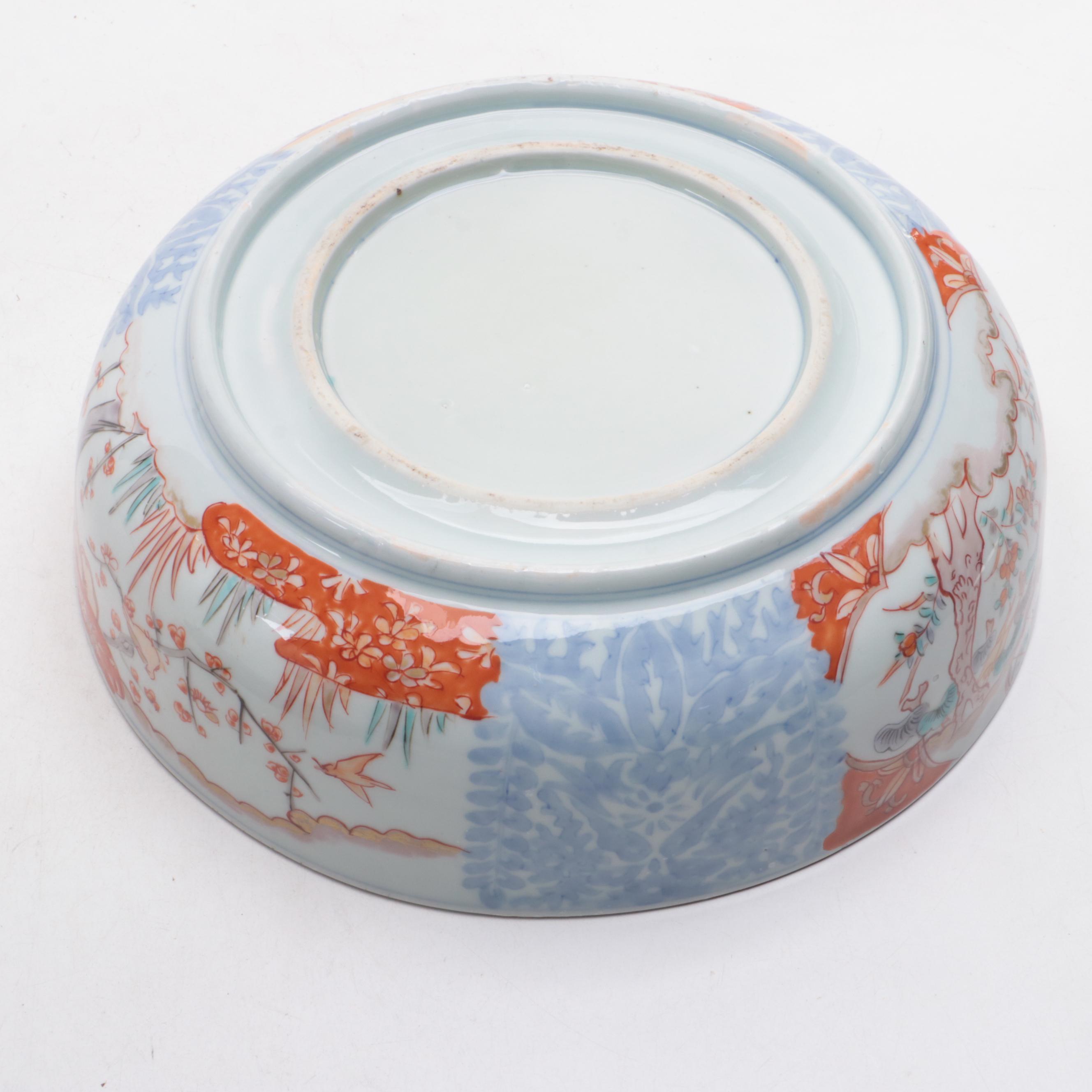 Japanese Imari Porcelain Bowl with Carved Stand