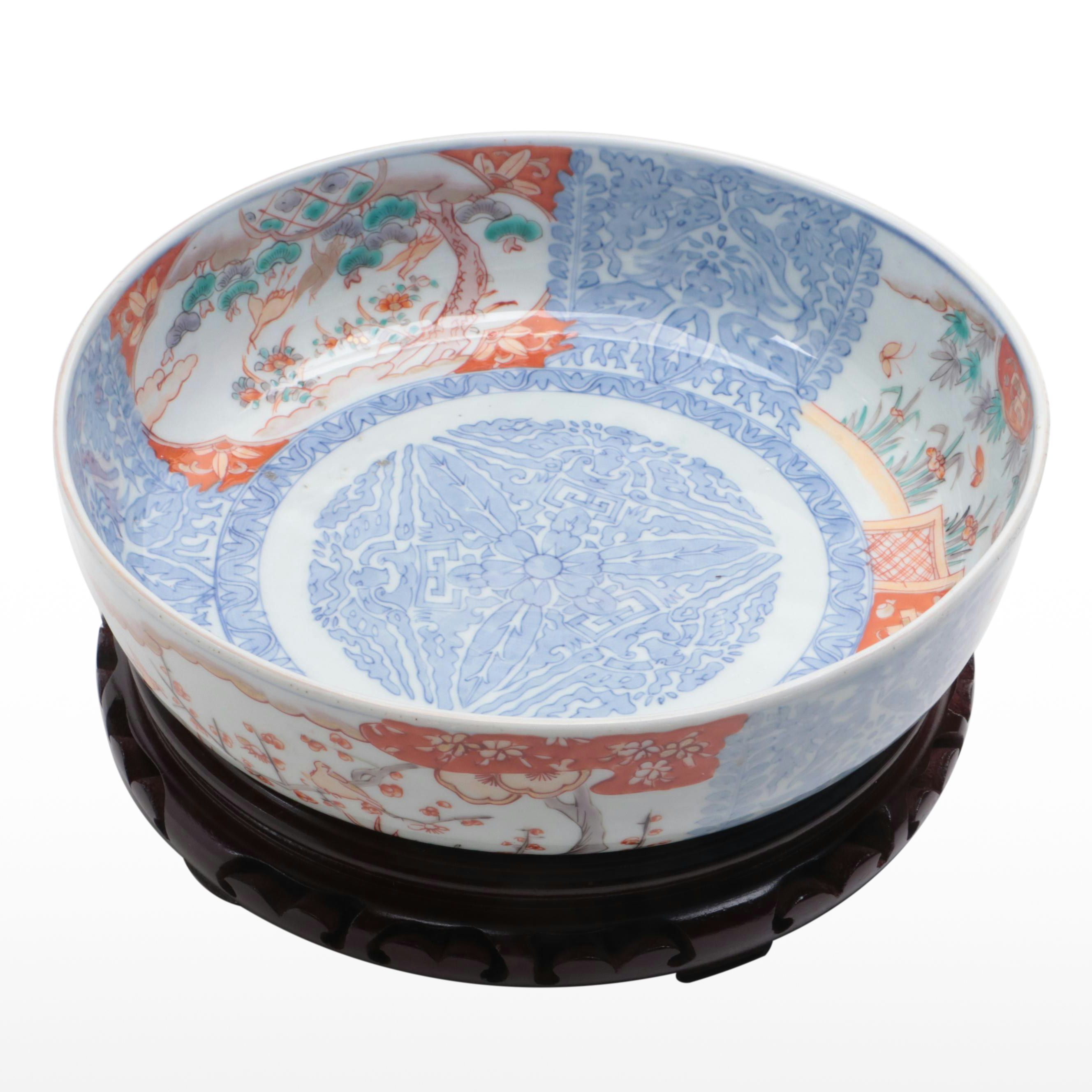 Japanese Imari Porcelain Bowl with Carved Stand