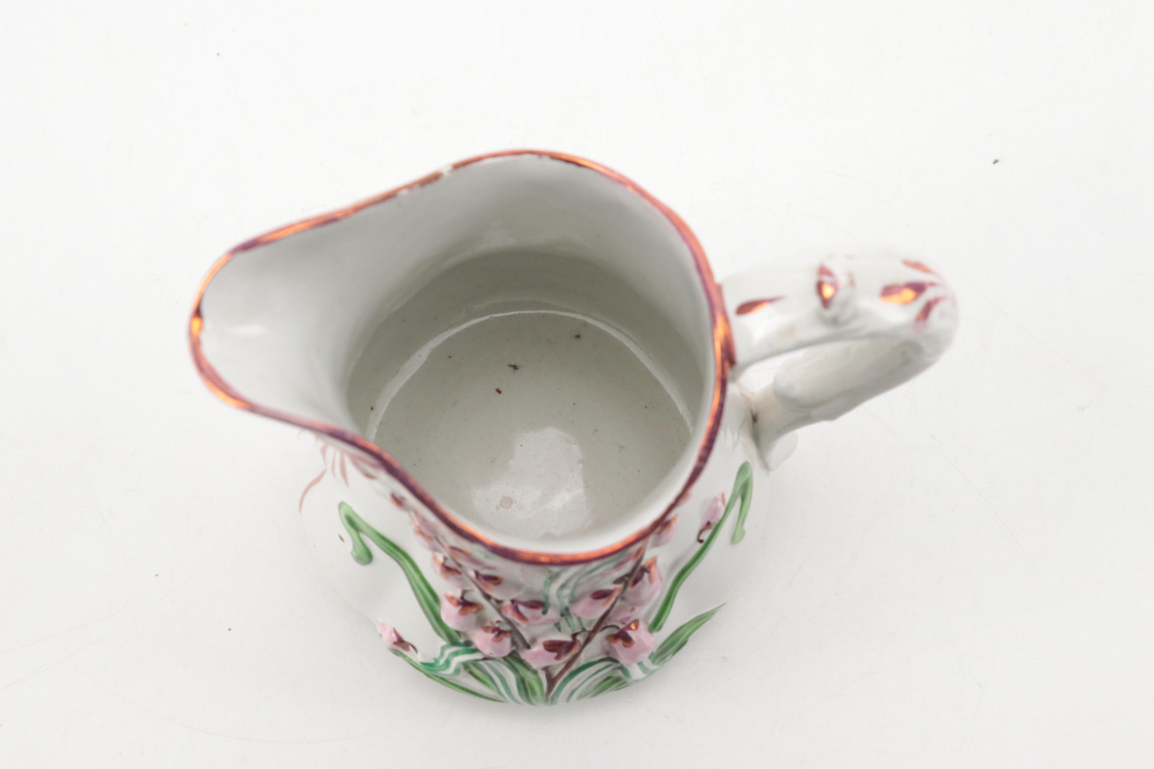 Ynysmeudwy Luster Accented Relief Molded Jug and Ridgway Style Plates