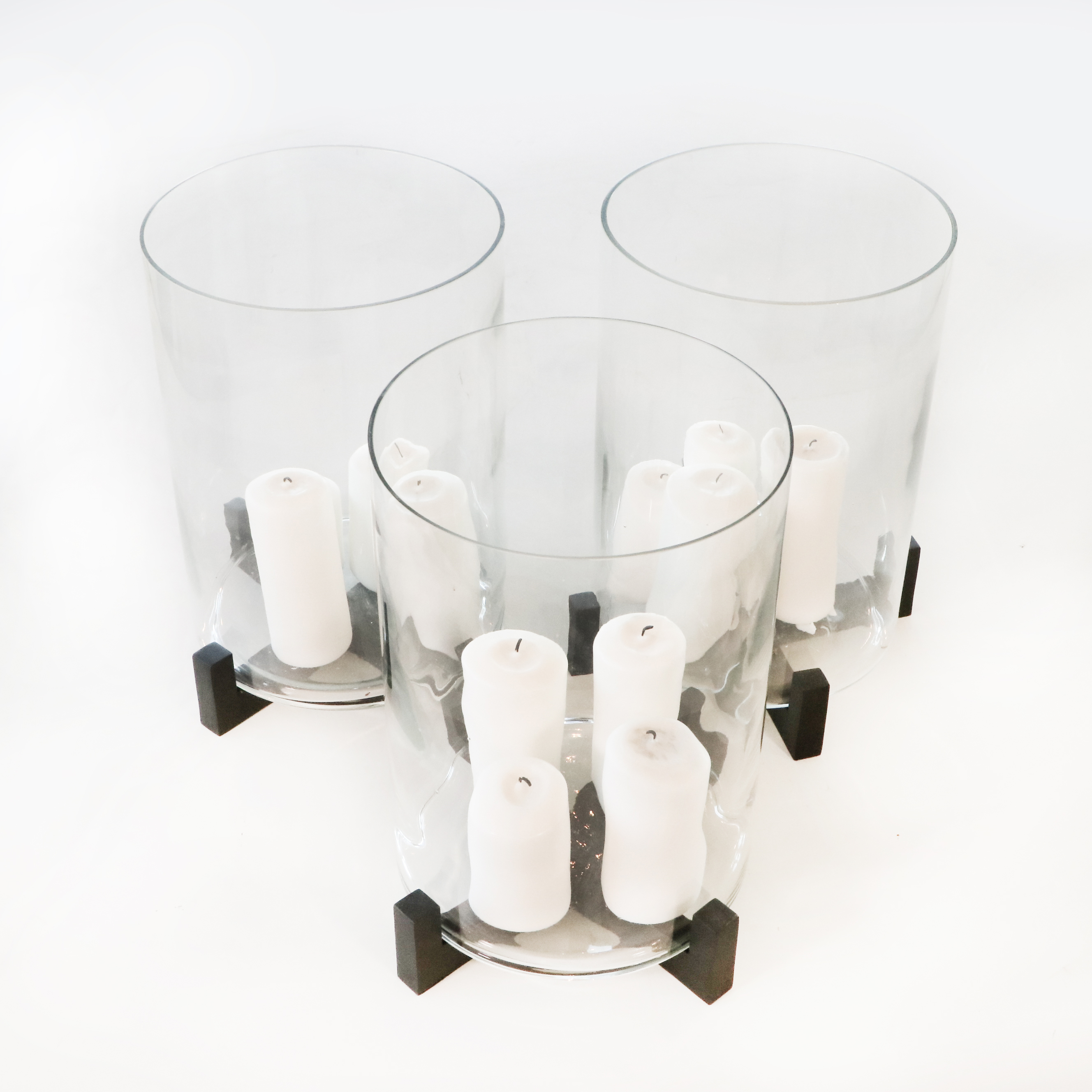 Three Oversized Glass Candle Hurricanes with Stands