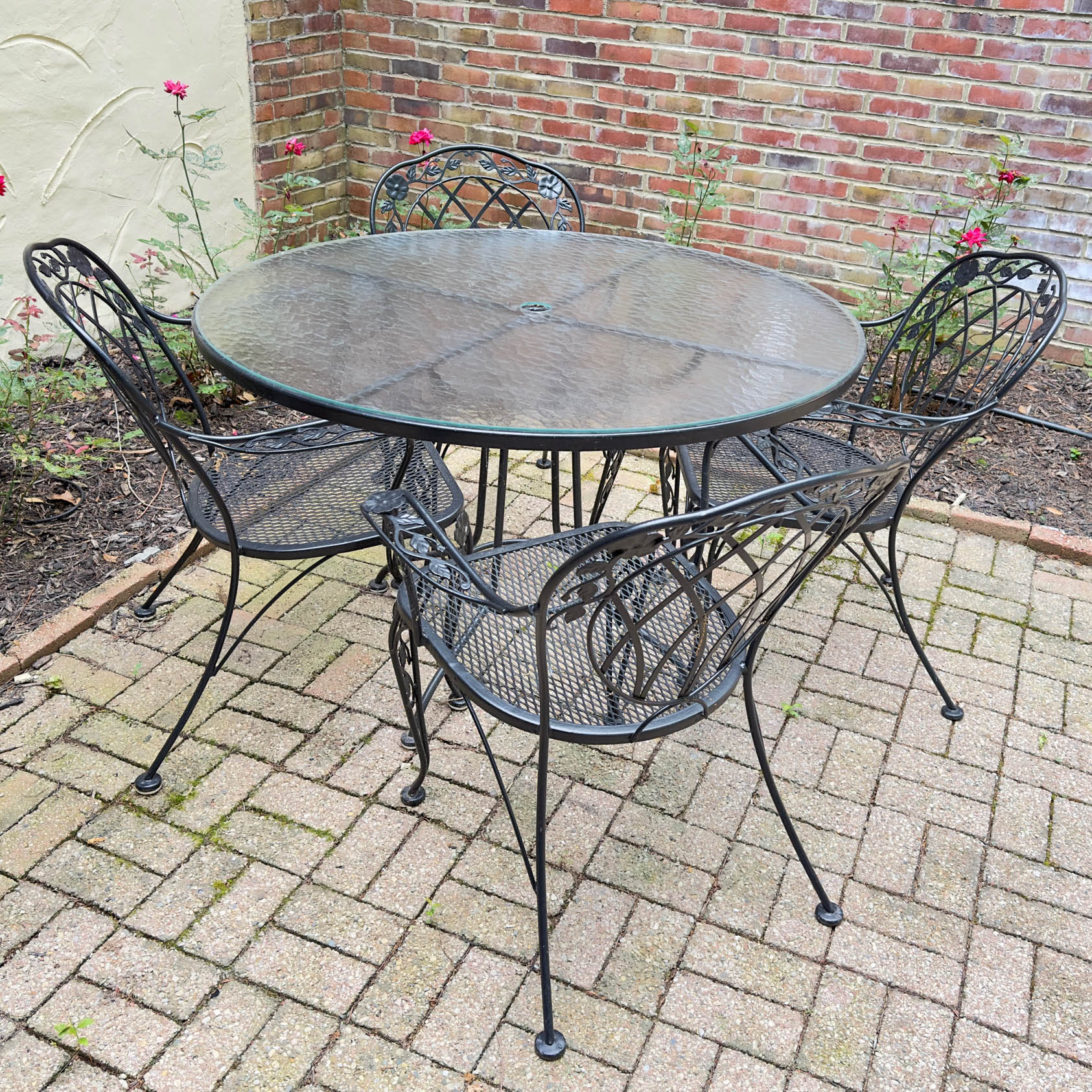 Glass-Top Patio Table and Four Openwork Floral Lattice Chairs