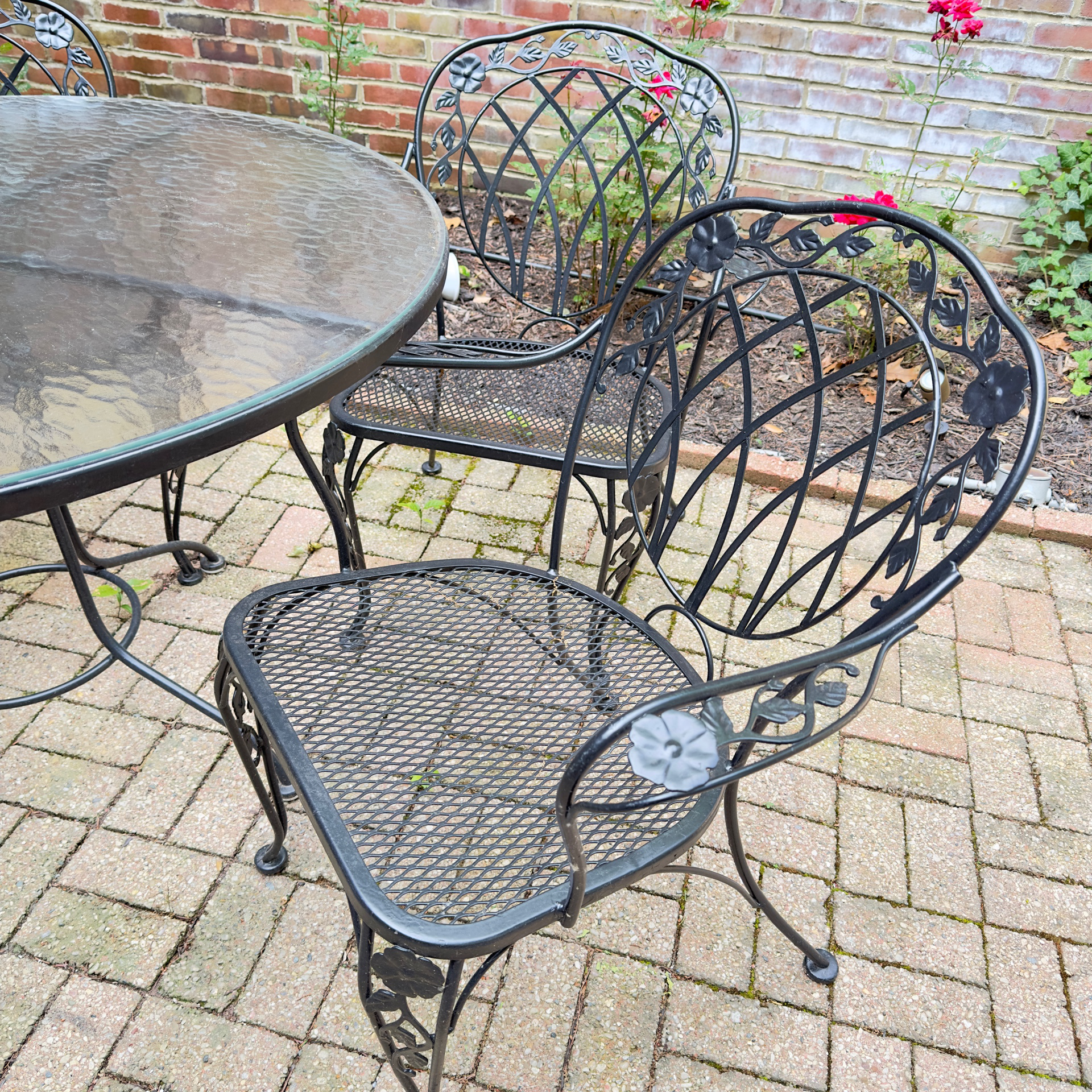 Glass-Top Patio Table and Four Openwork Floral Lattice Chairs