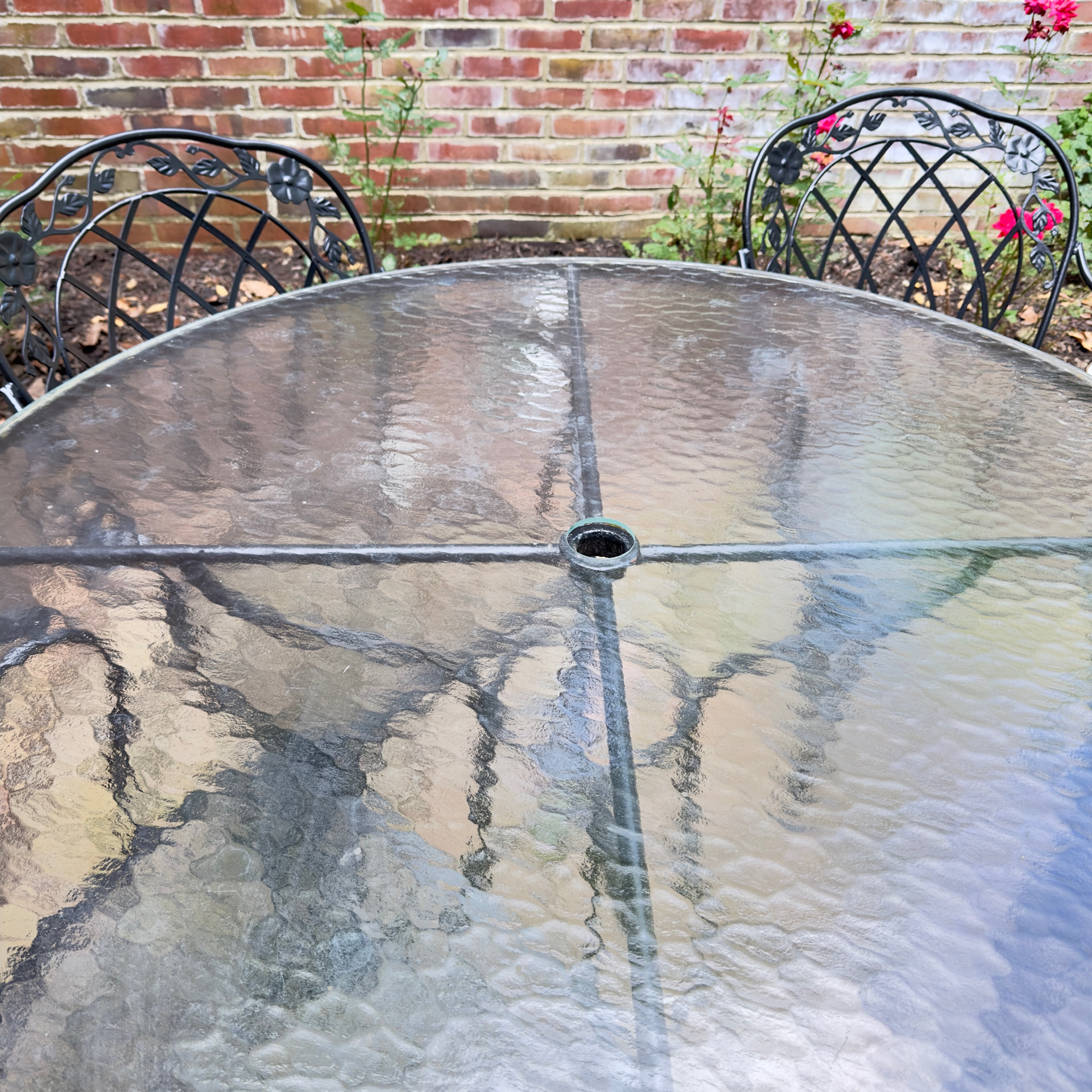Glass-Top Patio Table and Four Openwork Floral Lattice Chairs