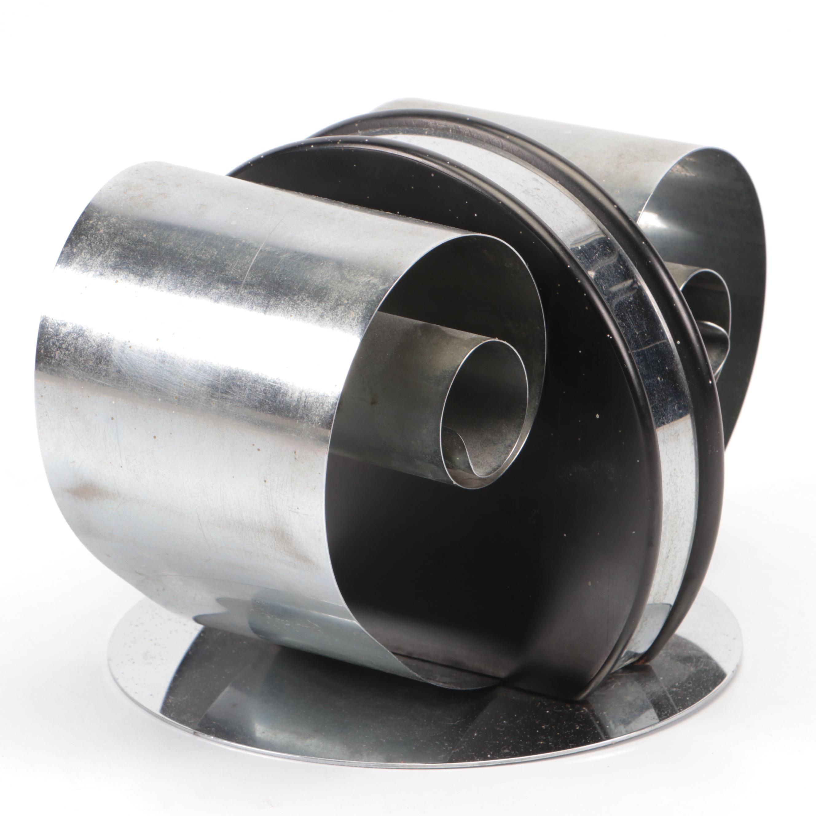 Hand-Crafted Iron Floral Candlestick with Other Steel and Wood Figurine