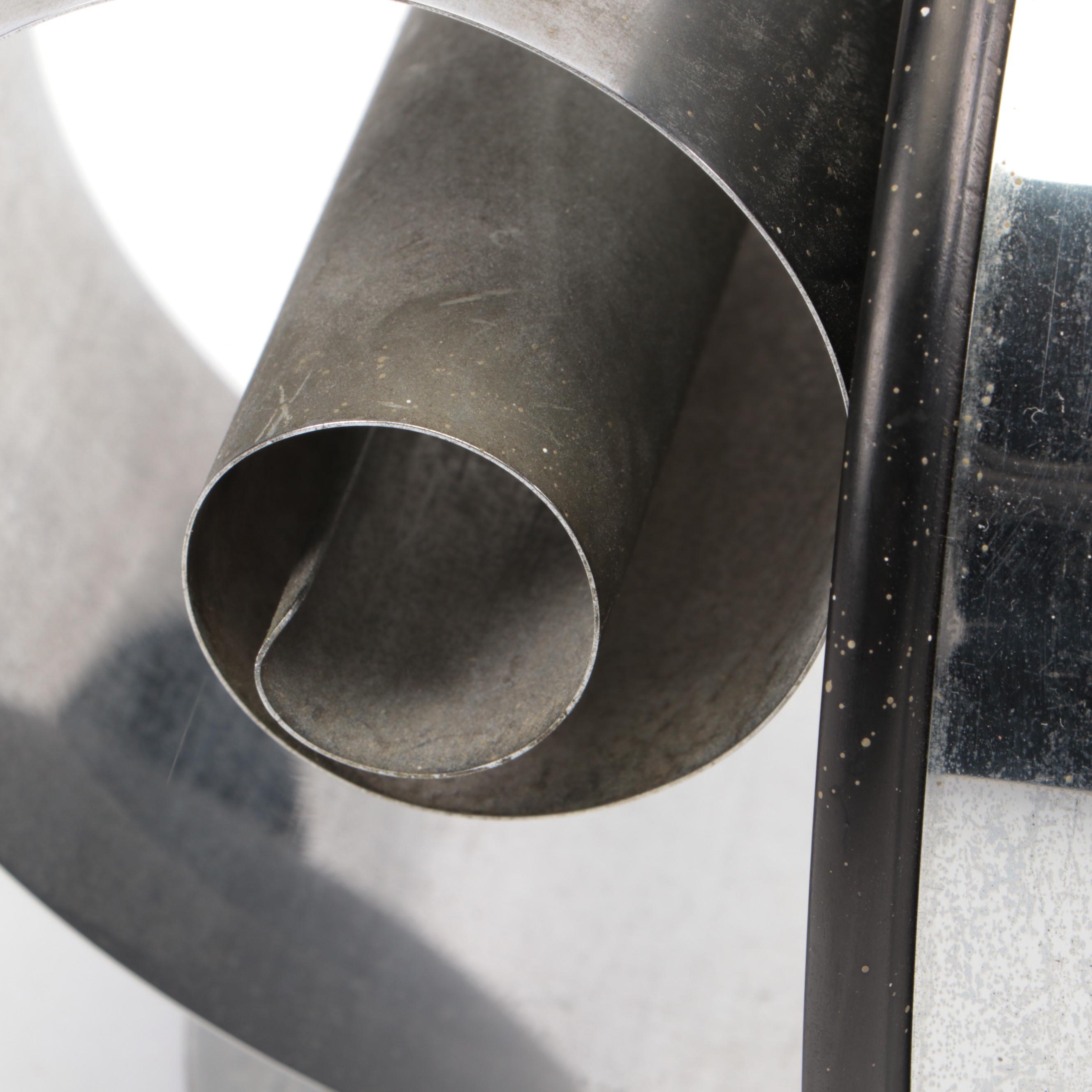 Hand-Crafted Iron Floral Candlestick with Other Steel and Wood Figurine