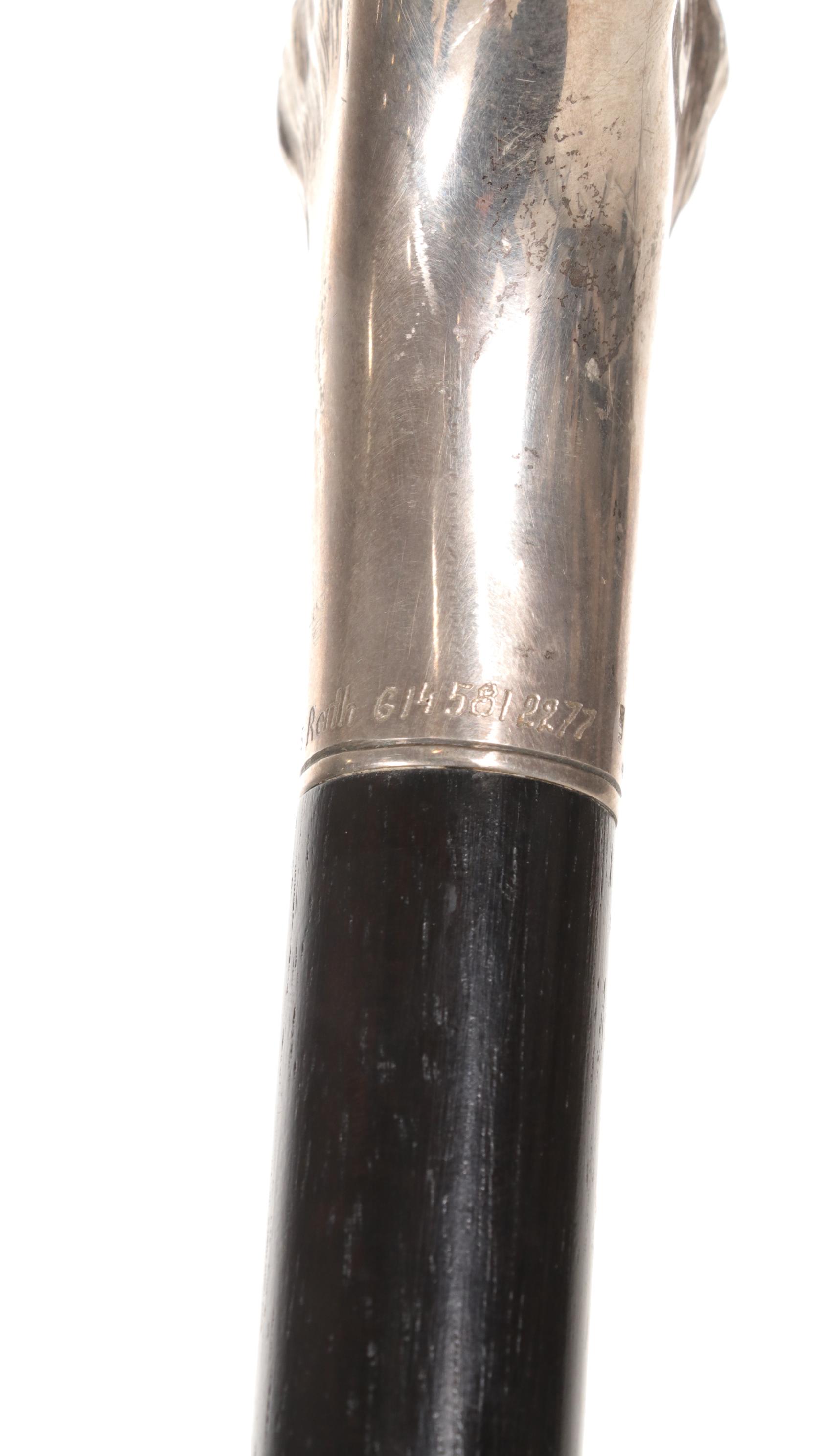 Sterling Silver Lion Handle and Ebonized Wood Sword Cane