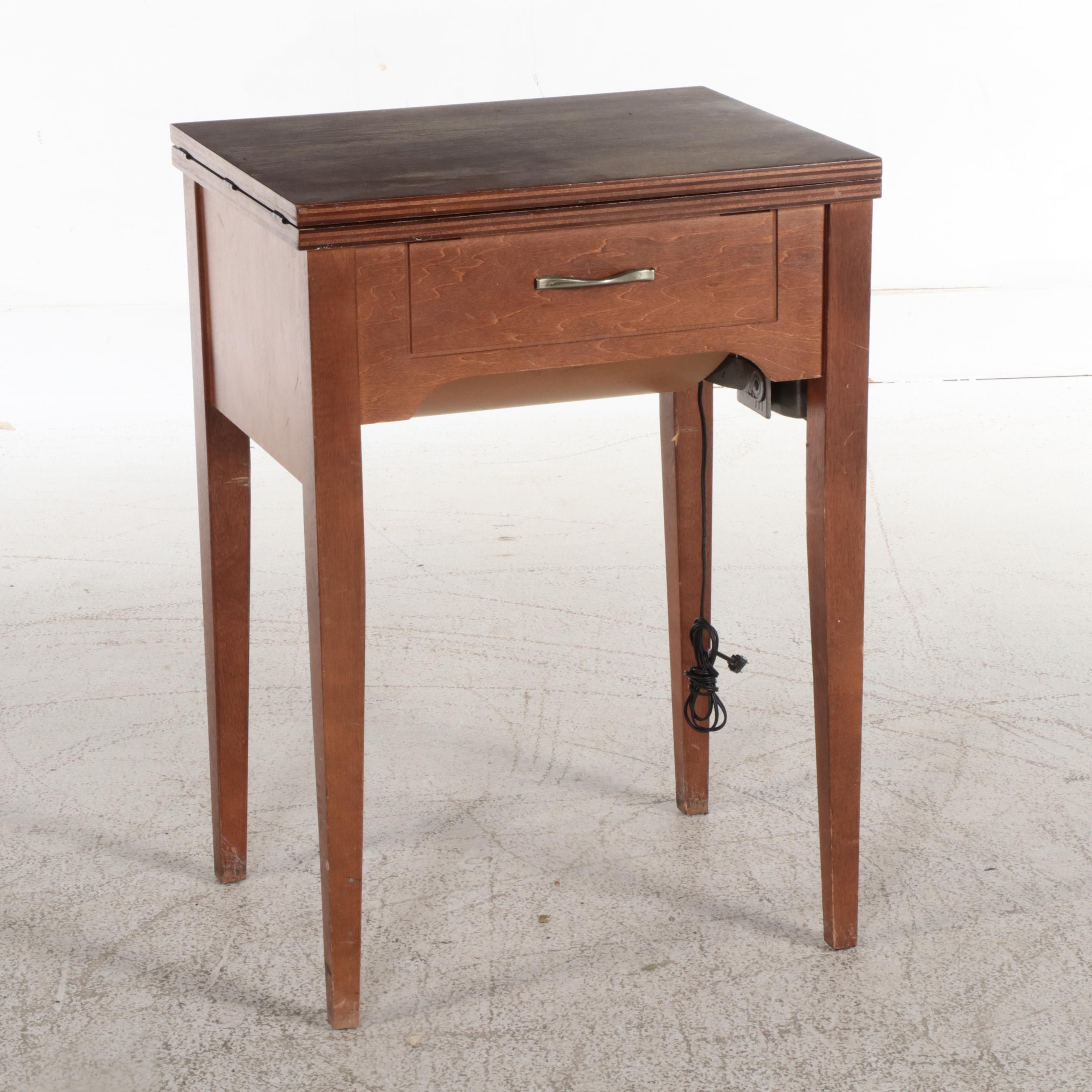 White Electric Sewing Machine in a Mahogany Table with Oak Chair