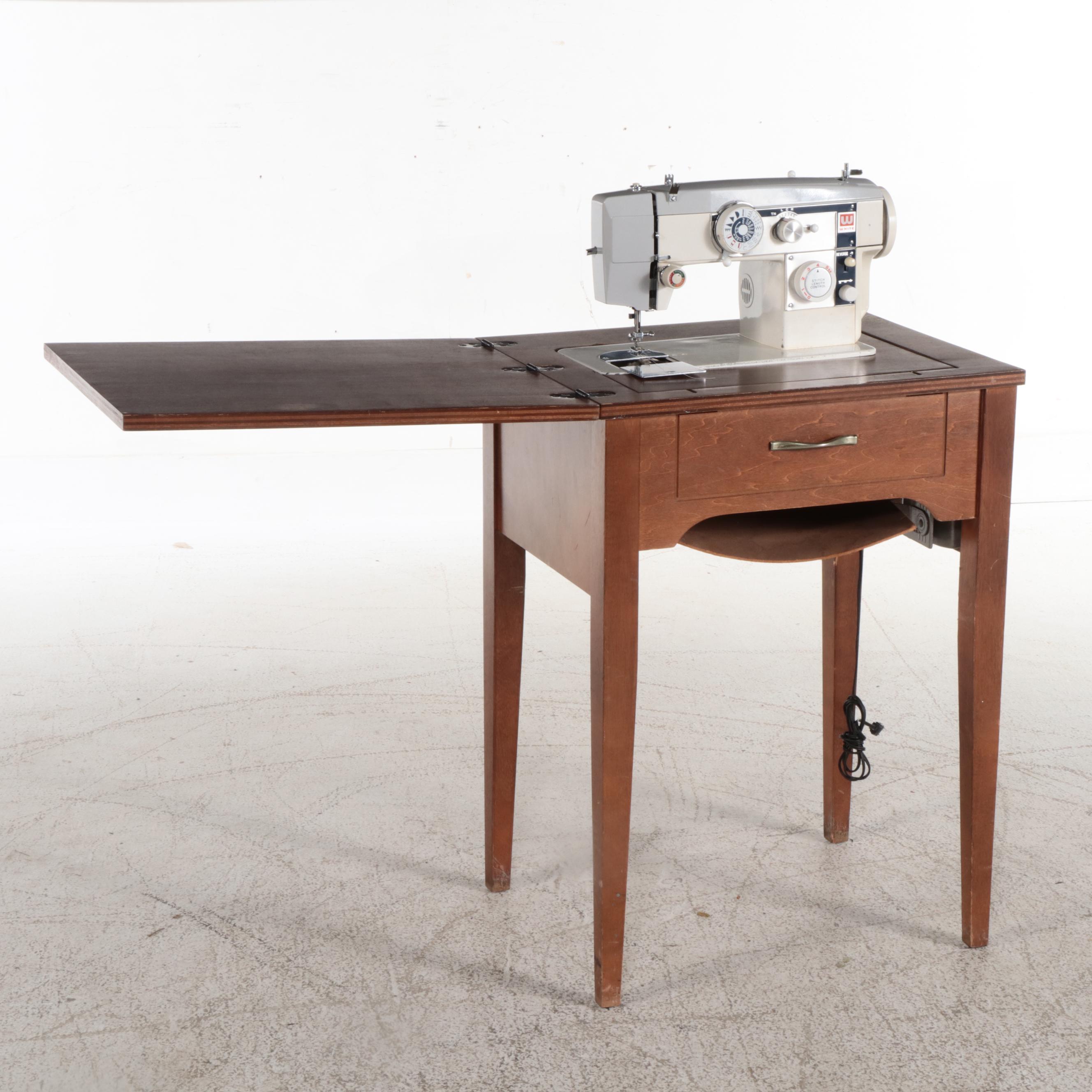 White Electric Sewing Machine in a Mahogany Table with Oak Chair
