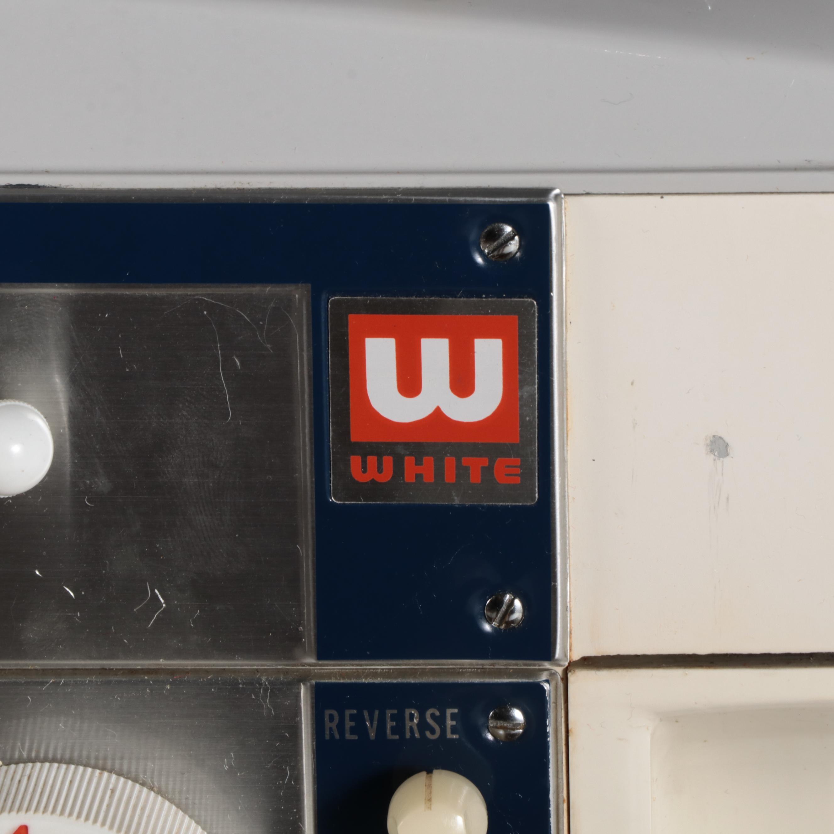 White Electric Sewing Machine in a Mahogany Table with Oak Chair