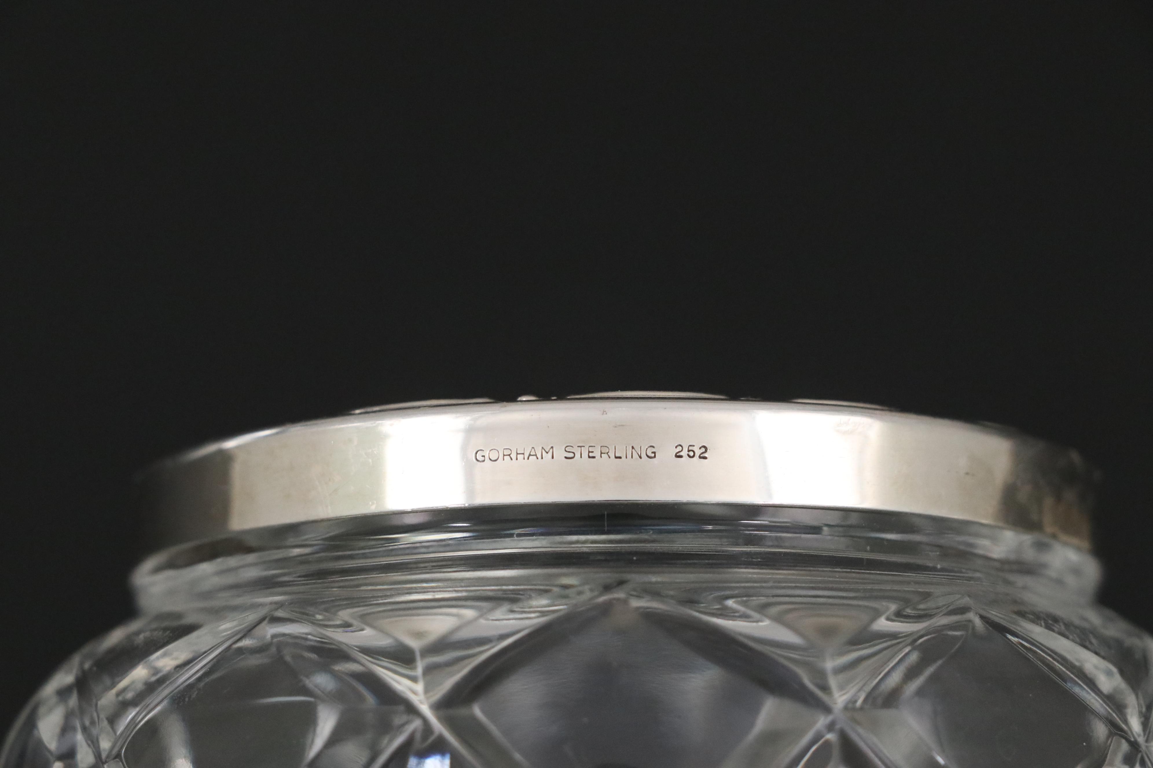 Gorham "Victorian" Sterling Hand Mirror, Brush, Comb, and Crystal Vanity Jars