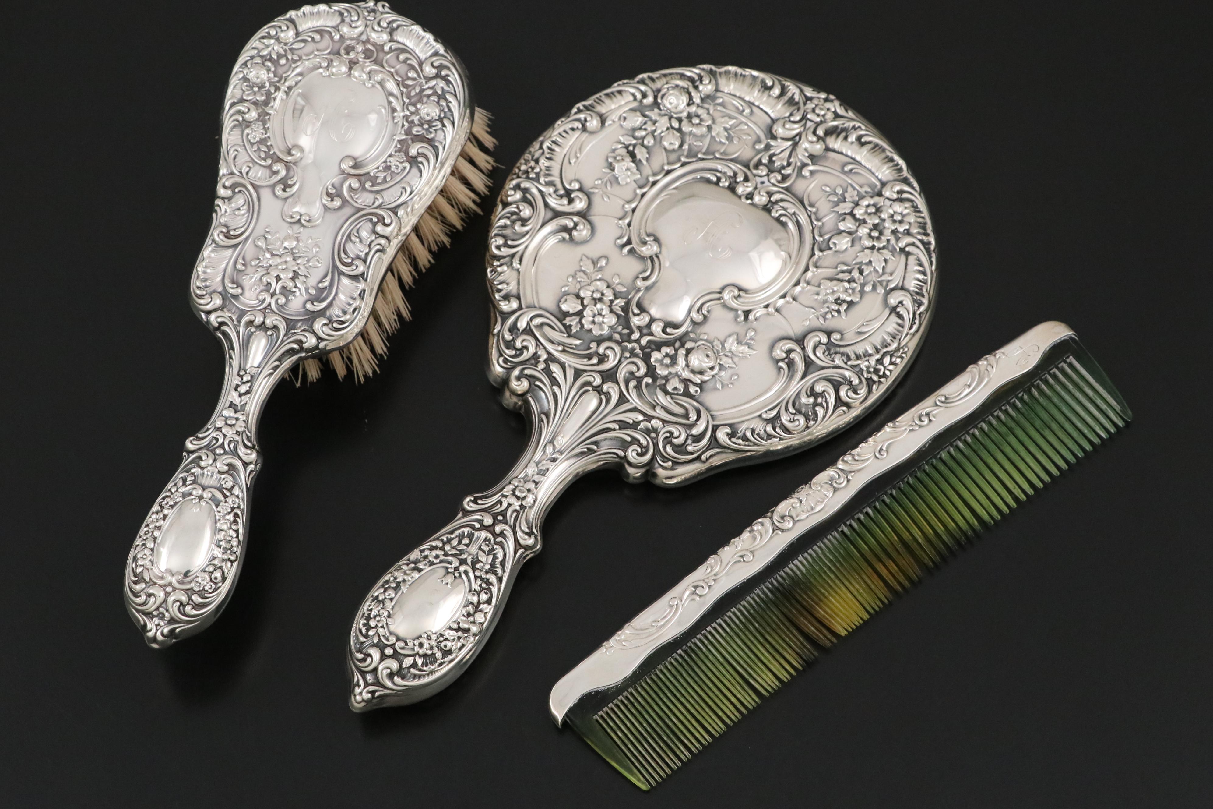 Gorham "Victorian" Sterling Hand Mirror, Brush, Comb, and Crystal Vanity Jars