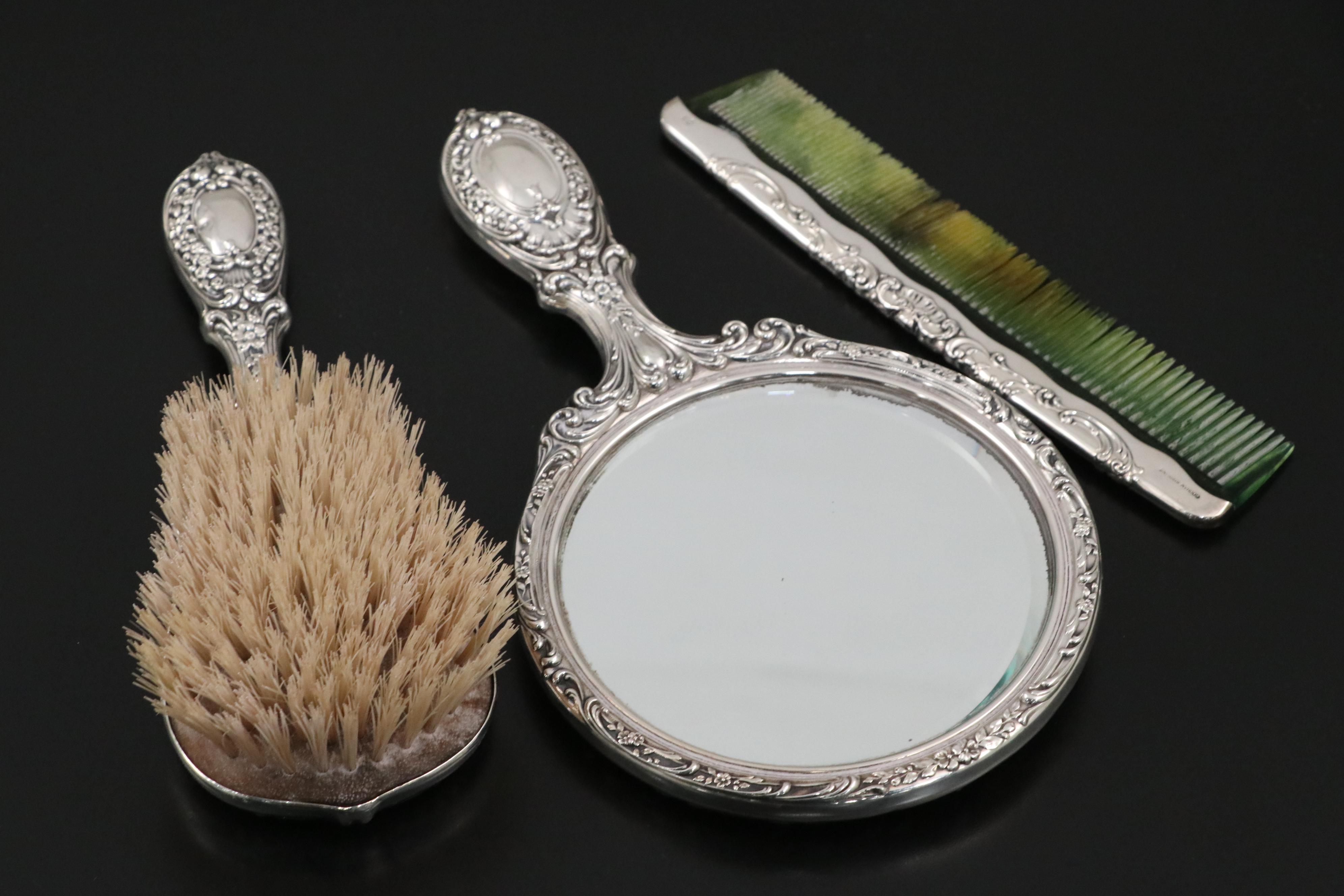 Gorham "Victorian" Sterling Hand Mirror, Brush, Comb, and Crystal Vanity Jars