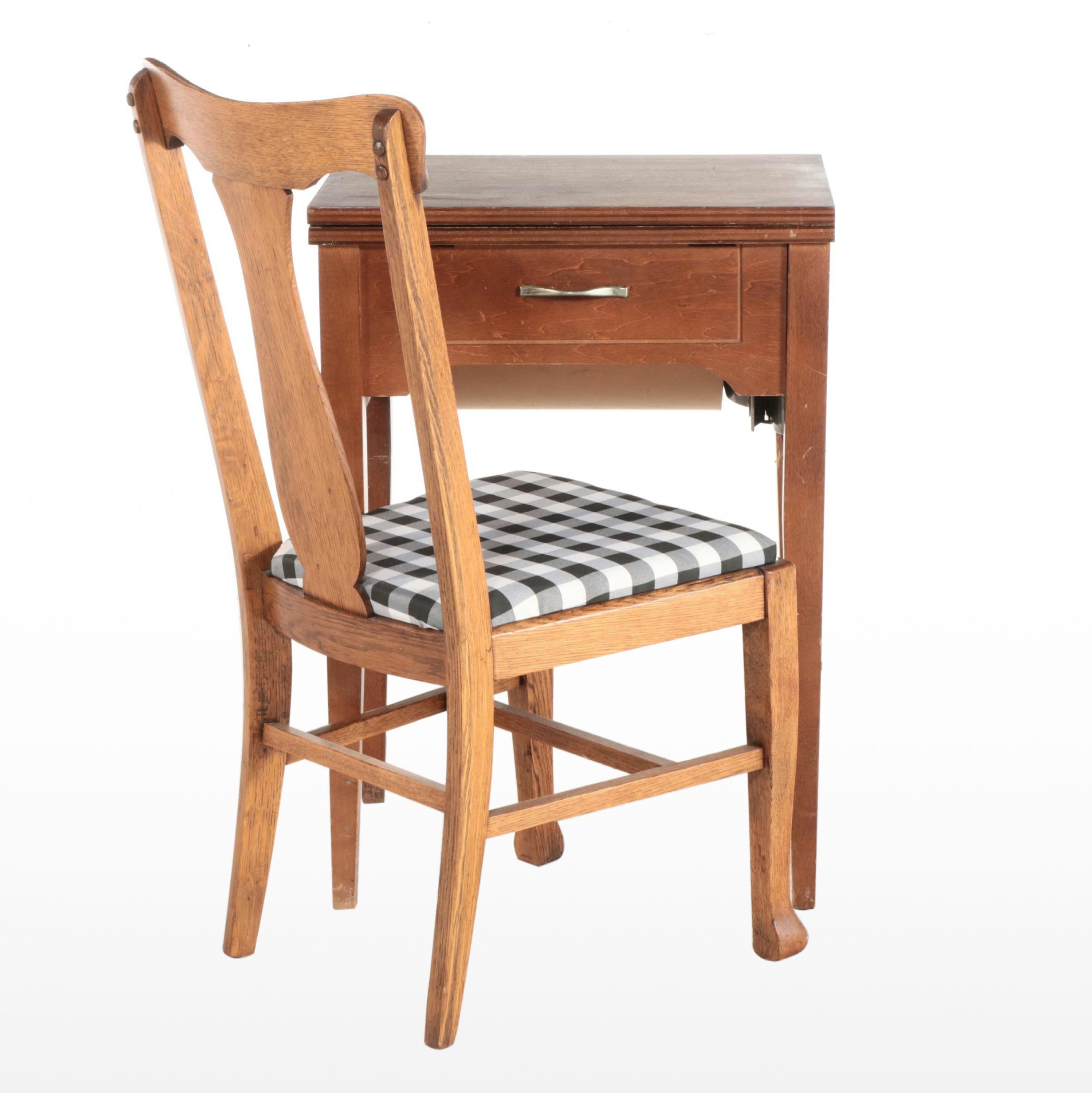 White Electric Sewing Machine in a Mahogany Table with Oak Chair