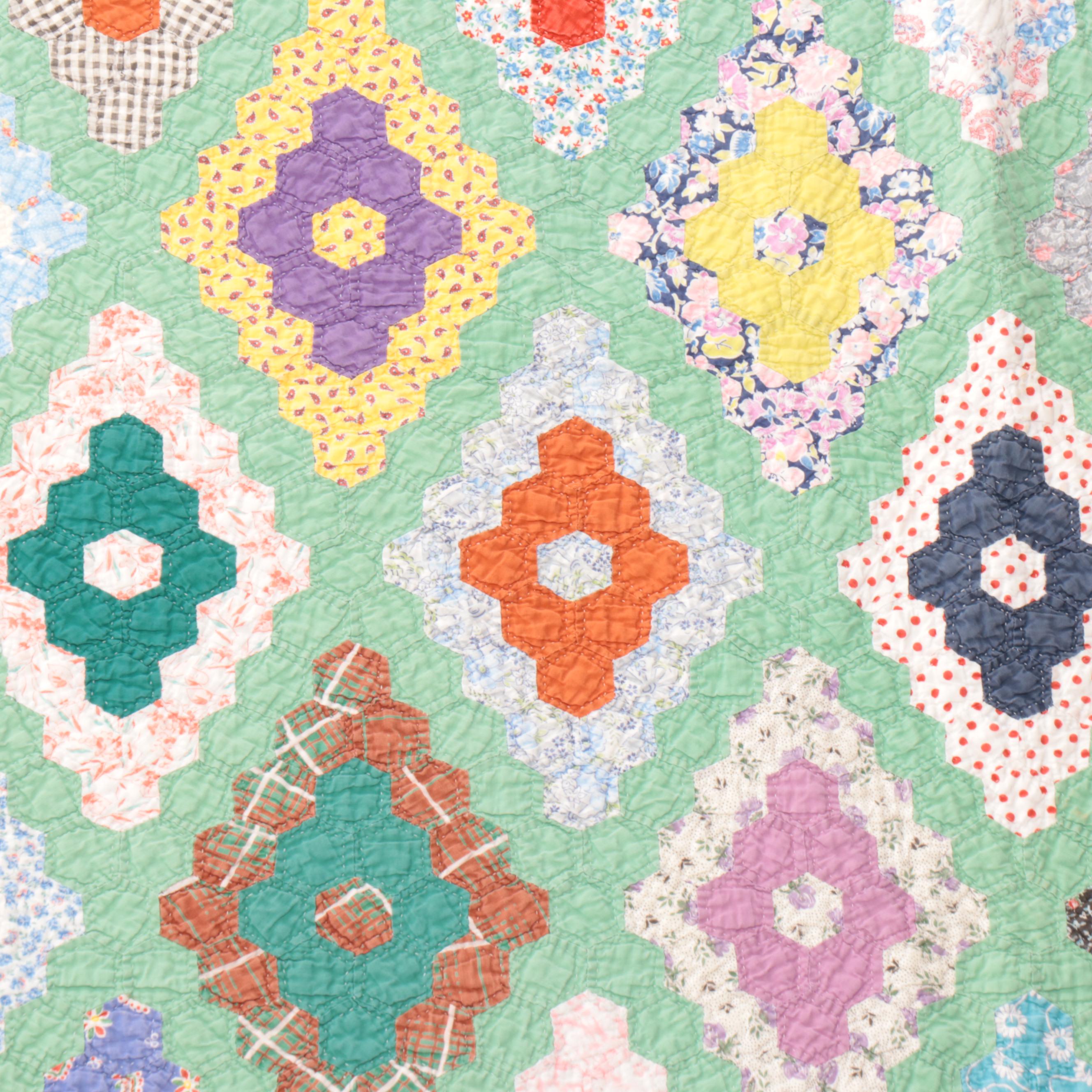 Handmade "Double Wedding Ring" and "Grandmother's Flower Garden" Quilts