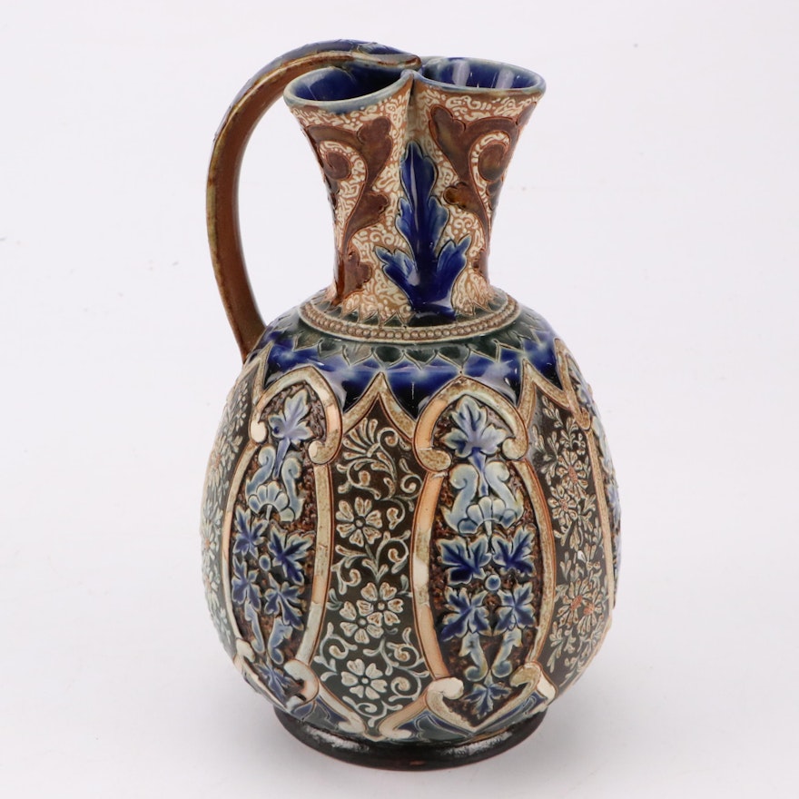 Doulton Lambeth Embossed Stoneware Pinched Three Spout Ewer, Late 19th Century