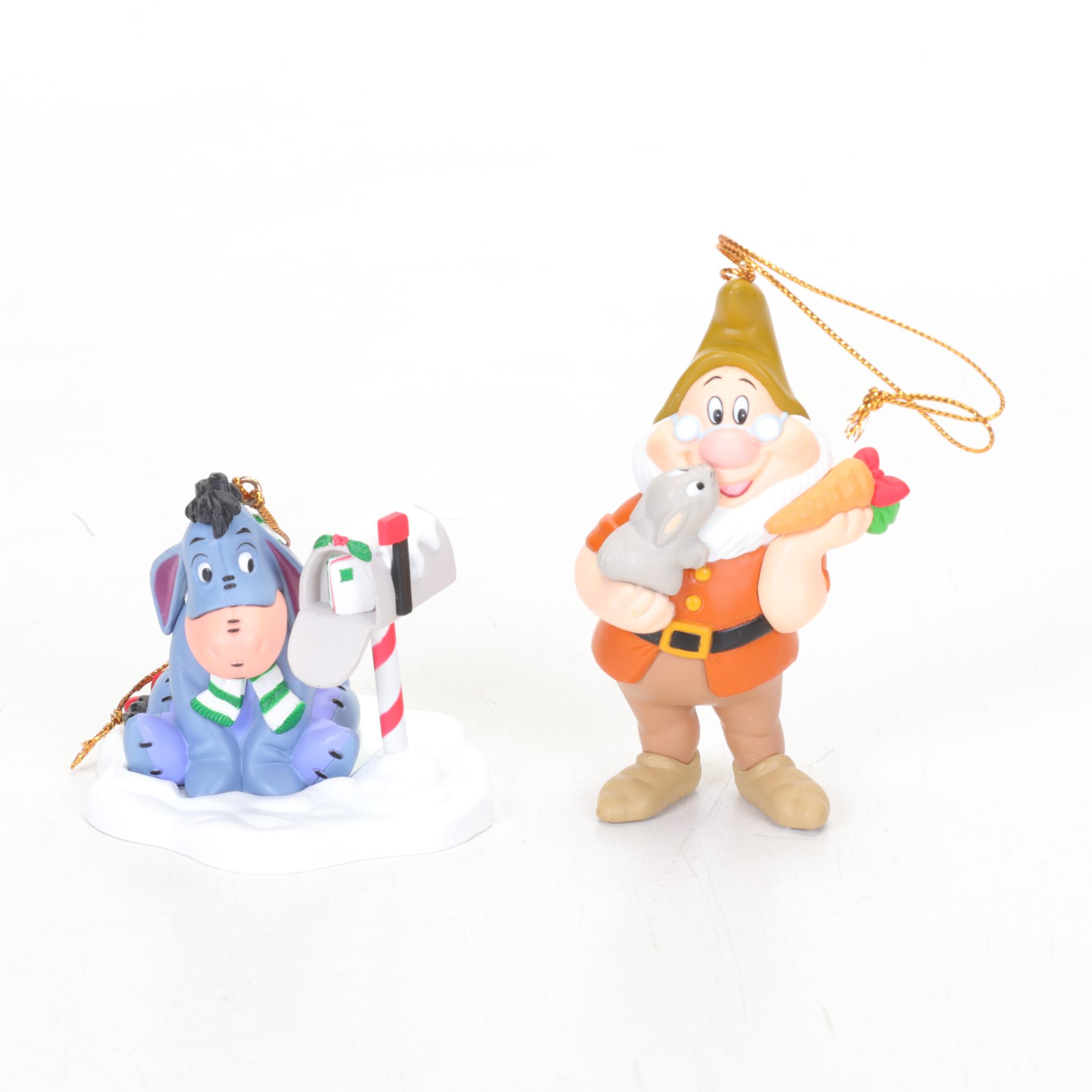 Walt Disney Ornaments and Classic VHS Tapes Including "Bambi" and "Snow White"