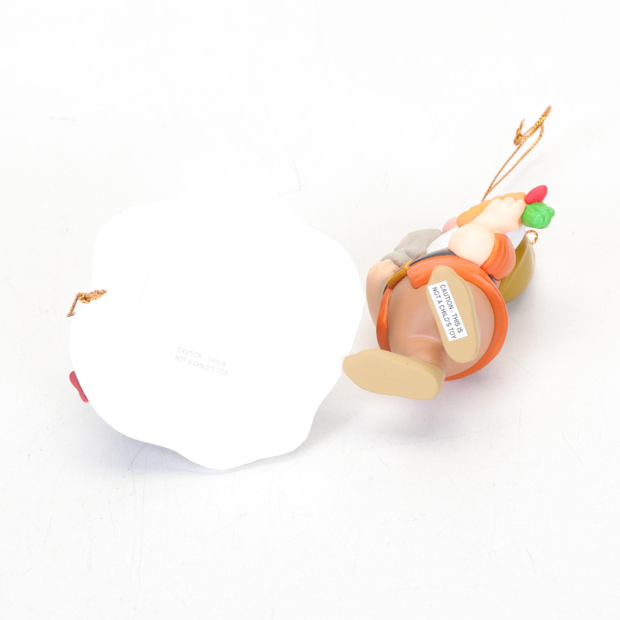 Walt Disney Ornaments and Classic VHS Tapes Including "Bambi" and "Snow White"