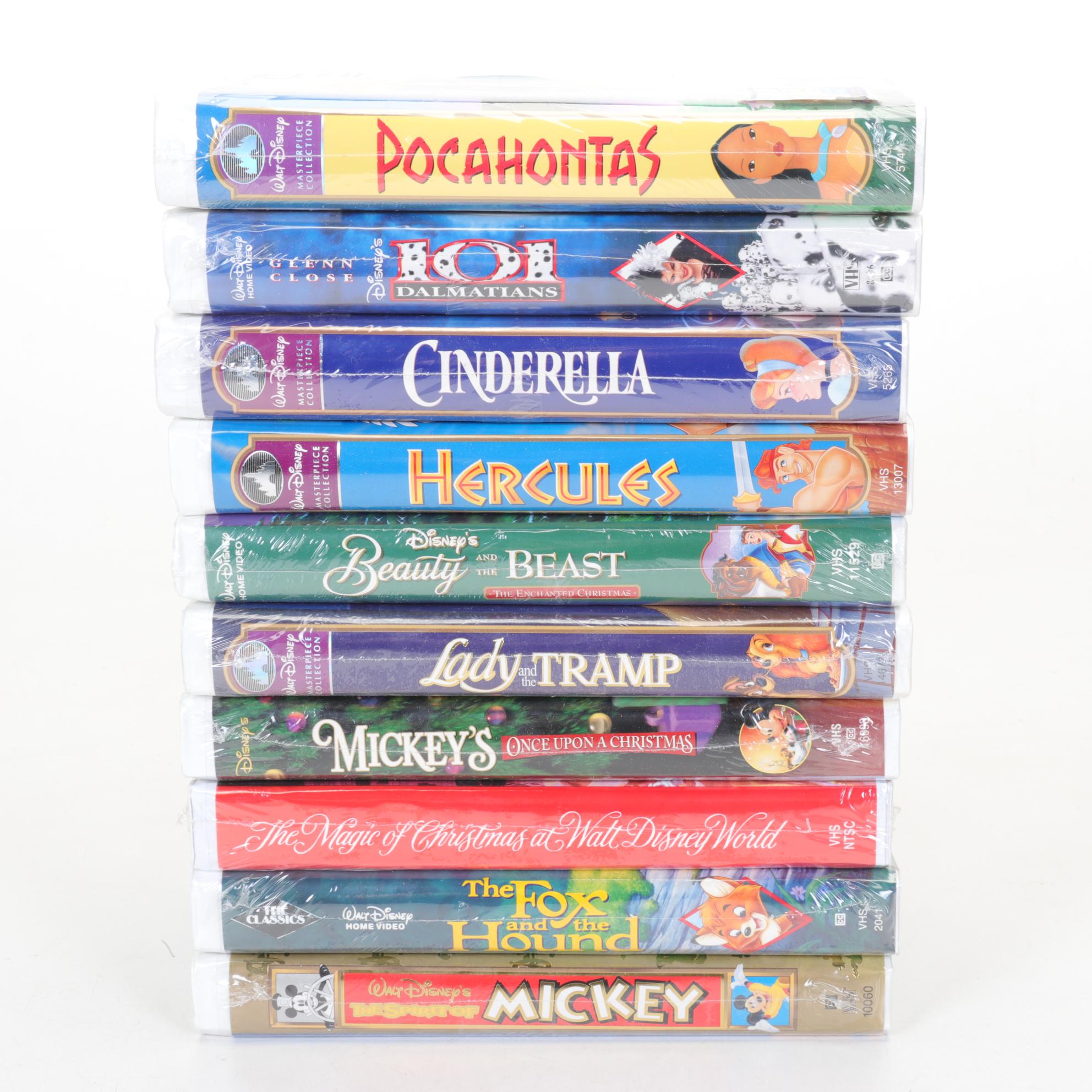 Walt Disney Ornaments and Classic VHS Tapes Including "Bambi" and "Snow White"