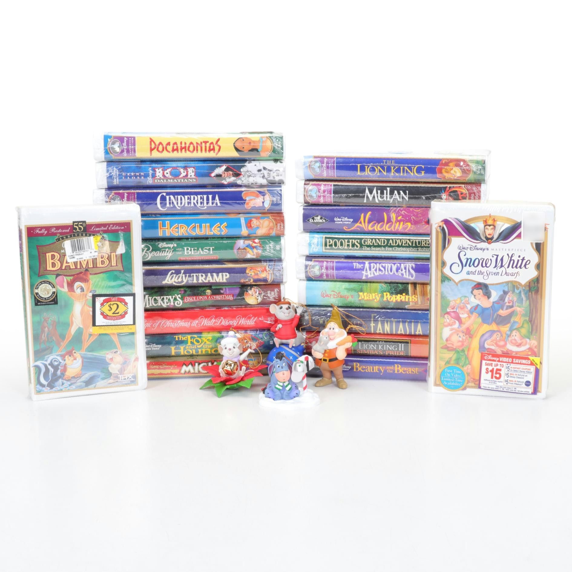 Walt Disney Ornaments and Classic VHS Tapes Including "Bambi" and "Snow White"