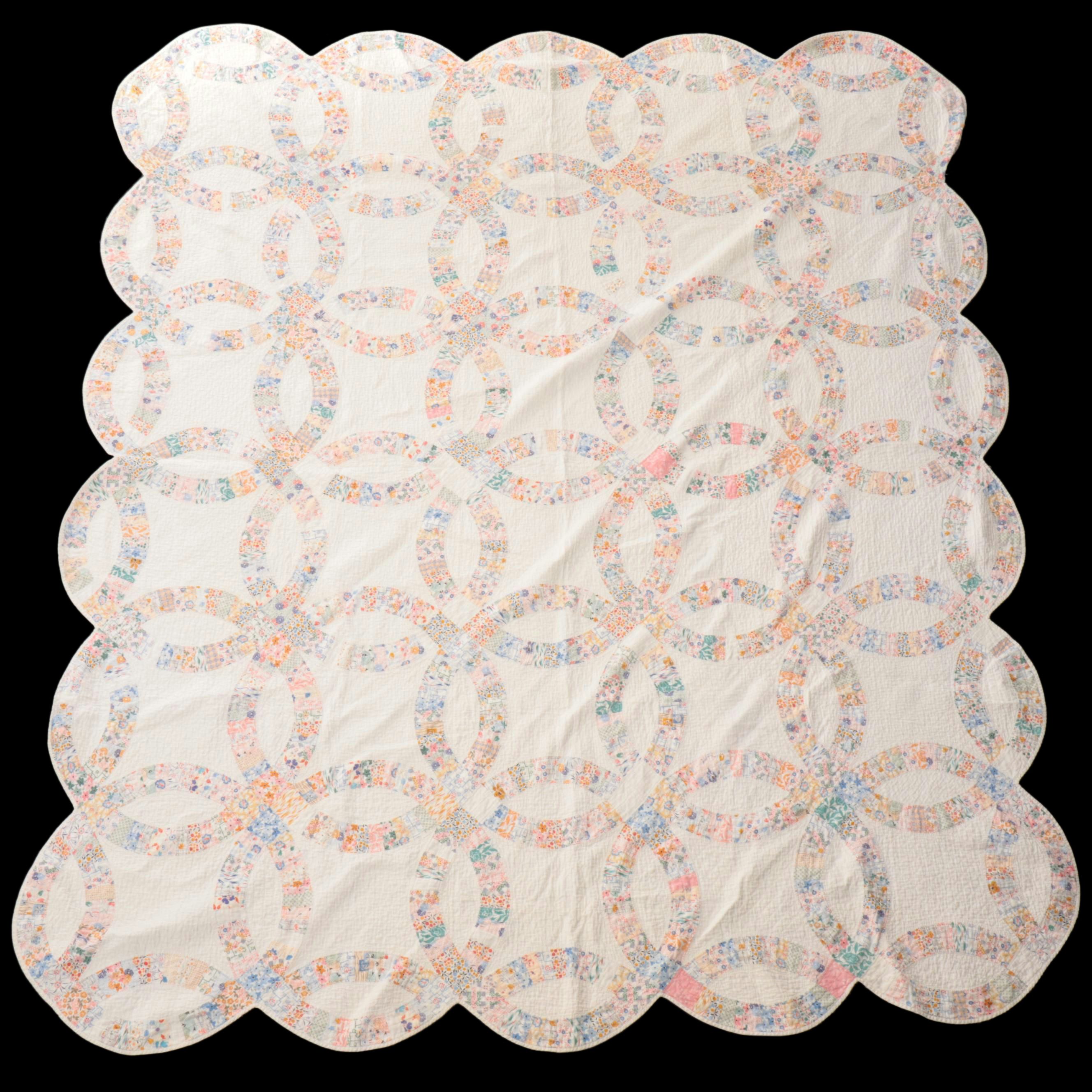 Handmade "Double Wedding Ring" and "Grandmother's Flower Garden" Quilts