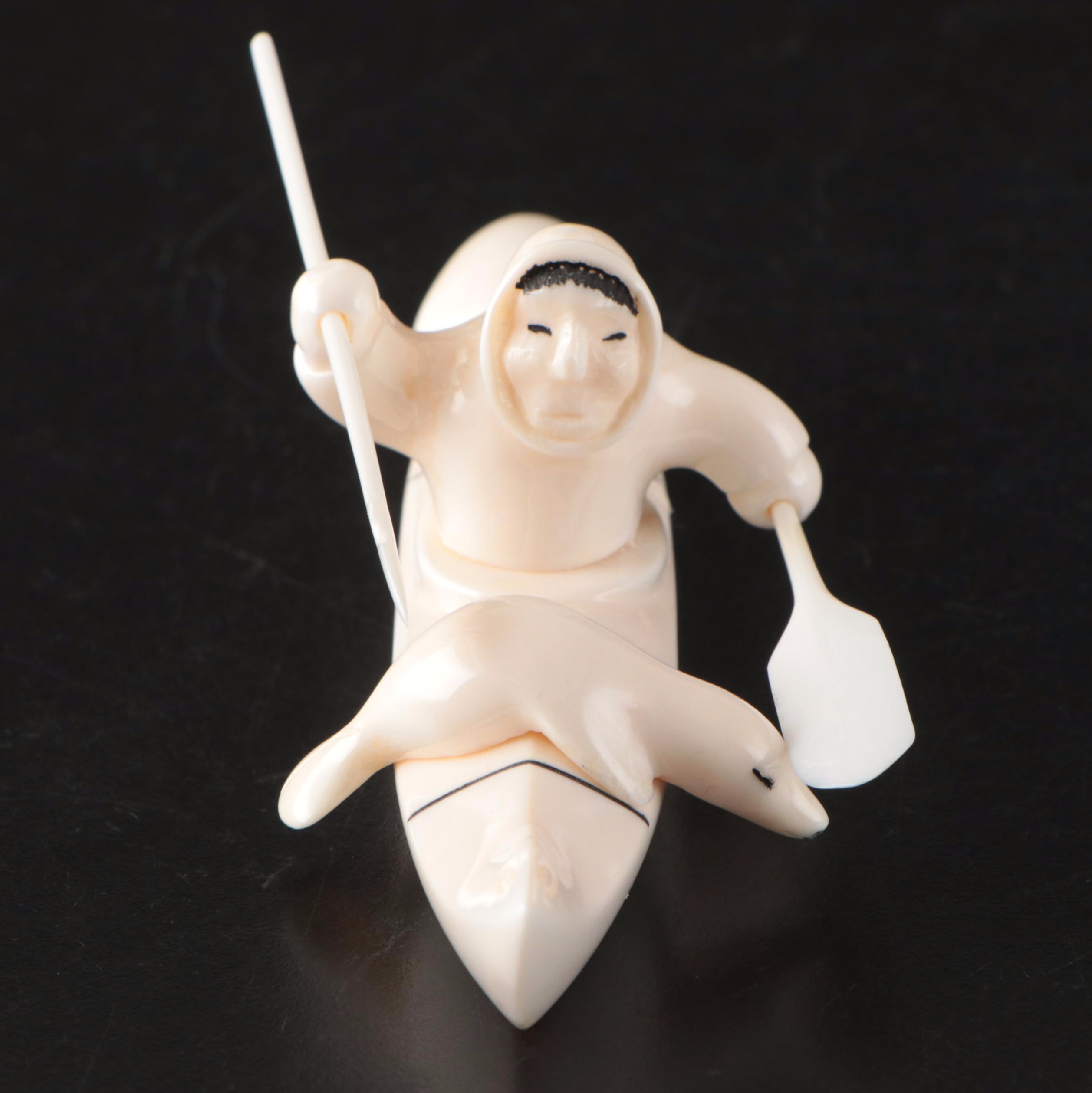 John Pullock Native Alaskan Carved Walrus Tusk Figure of Seal Hunter in Kayak