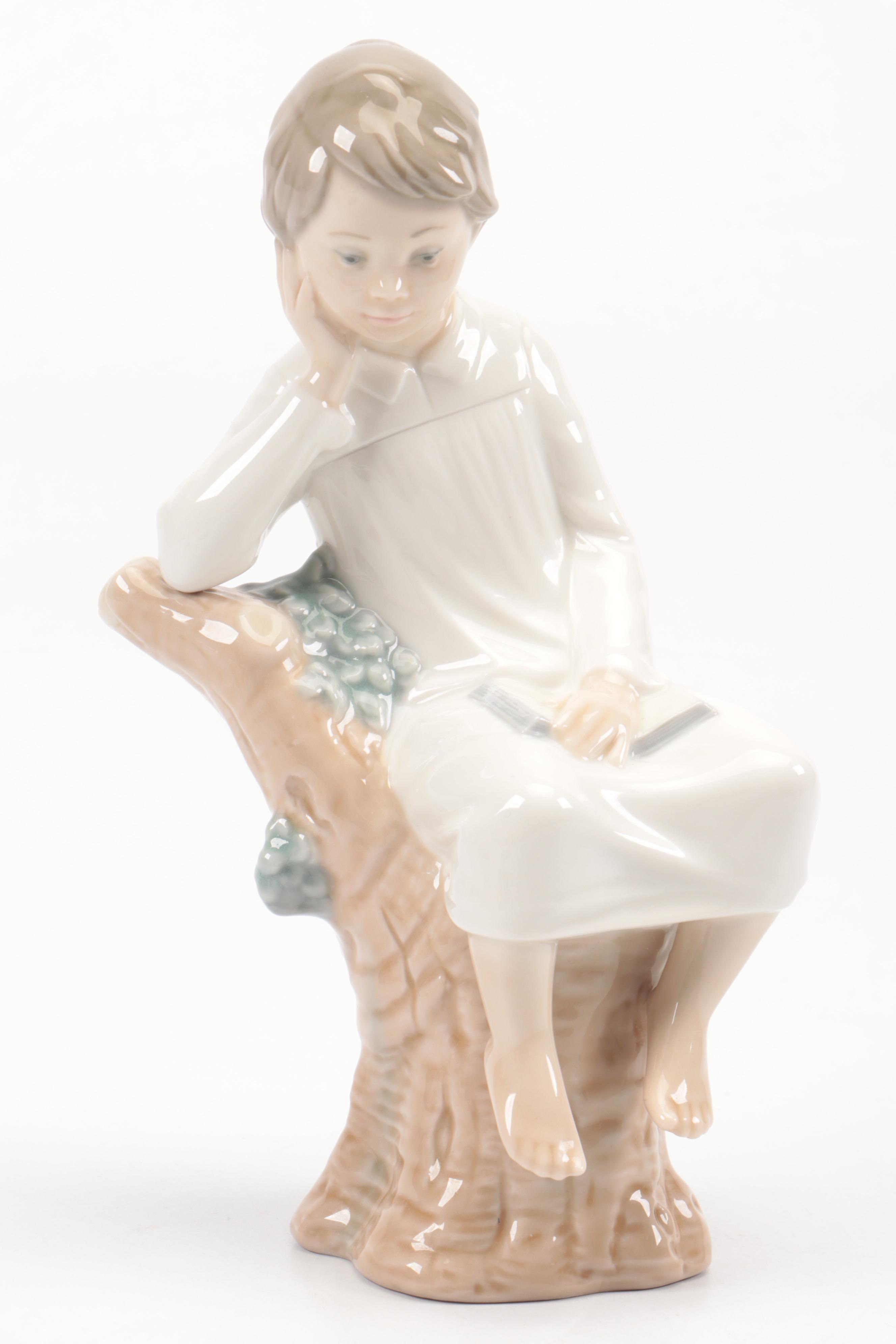Lladró "Little Boy Thinker" and "Girl with Slippers" Porcelain Figurines