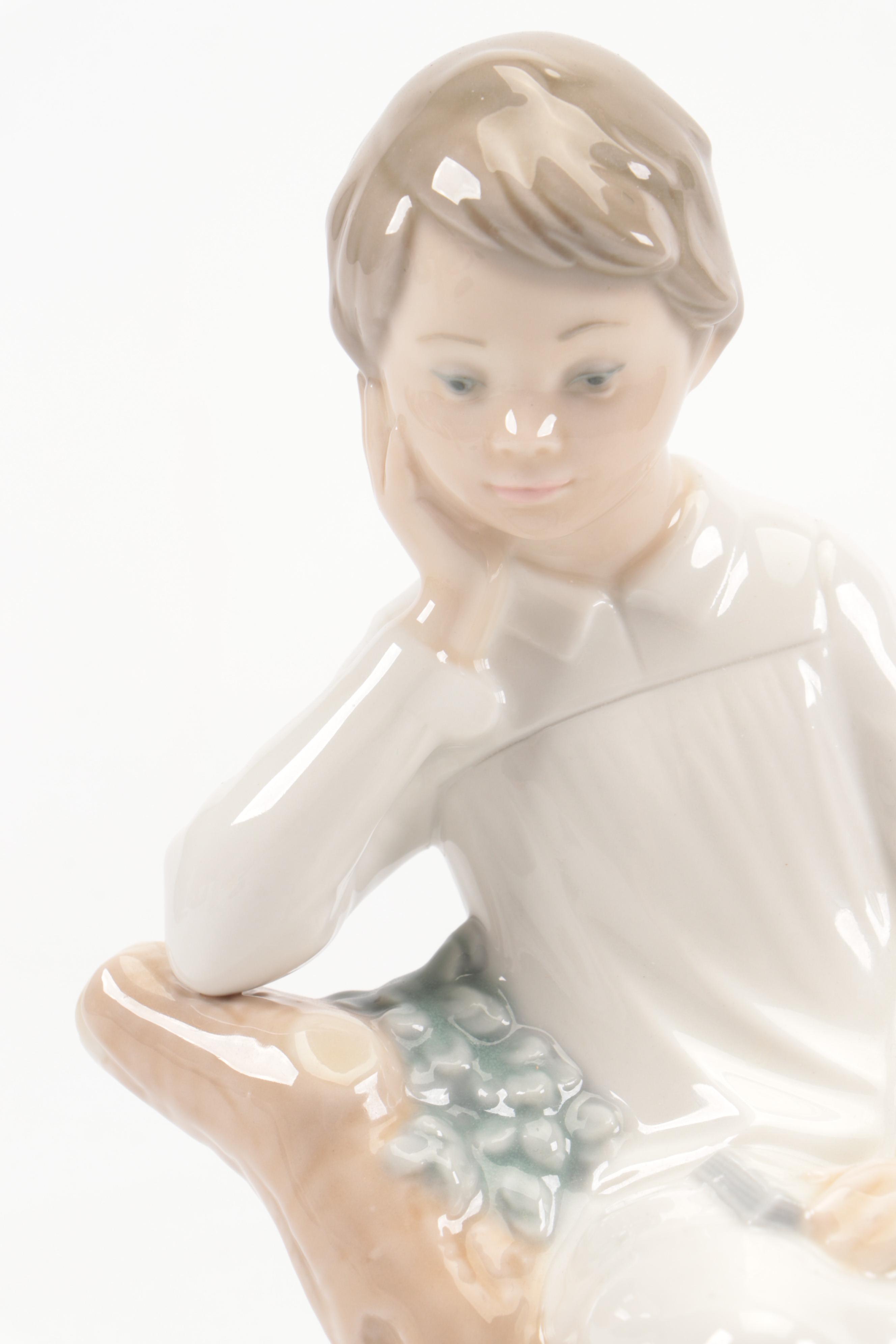 Lladró "Little Boy Thinker" and "Girl with Slippers" Porcelain Figurines