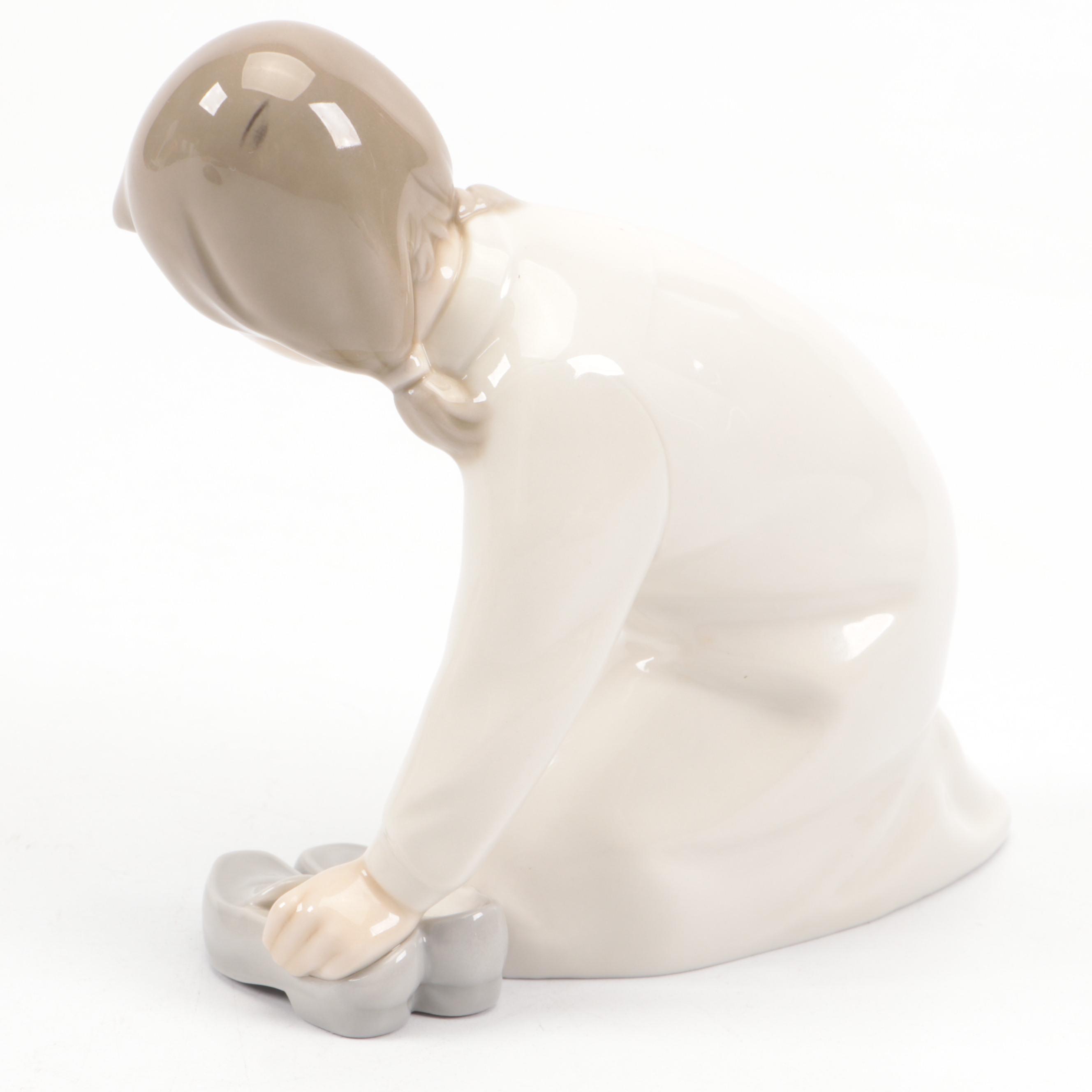 Lladró "Little Boy Thinker" and "Girl with Slippers" Porcelain Figurines