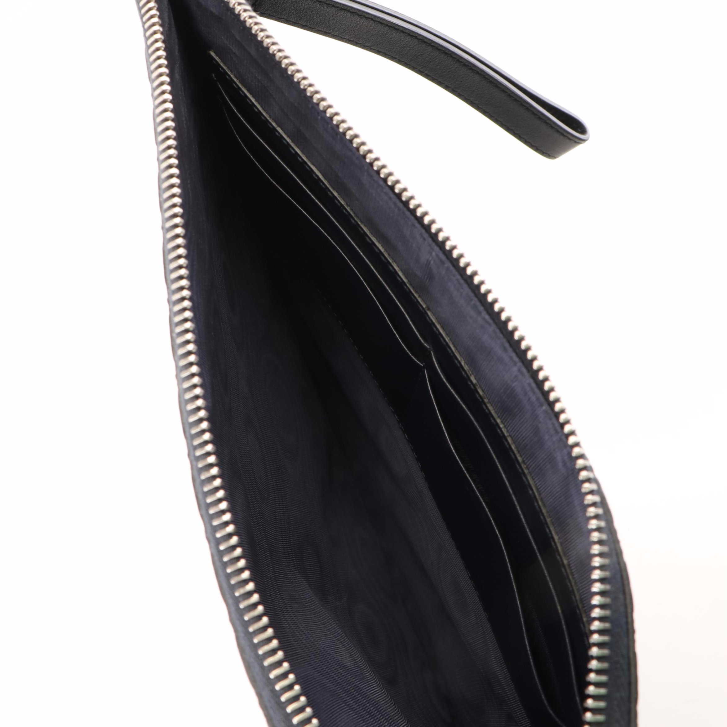 Gucci Microguccissima Clutch Bag with Wristlet