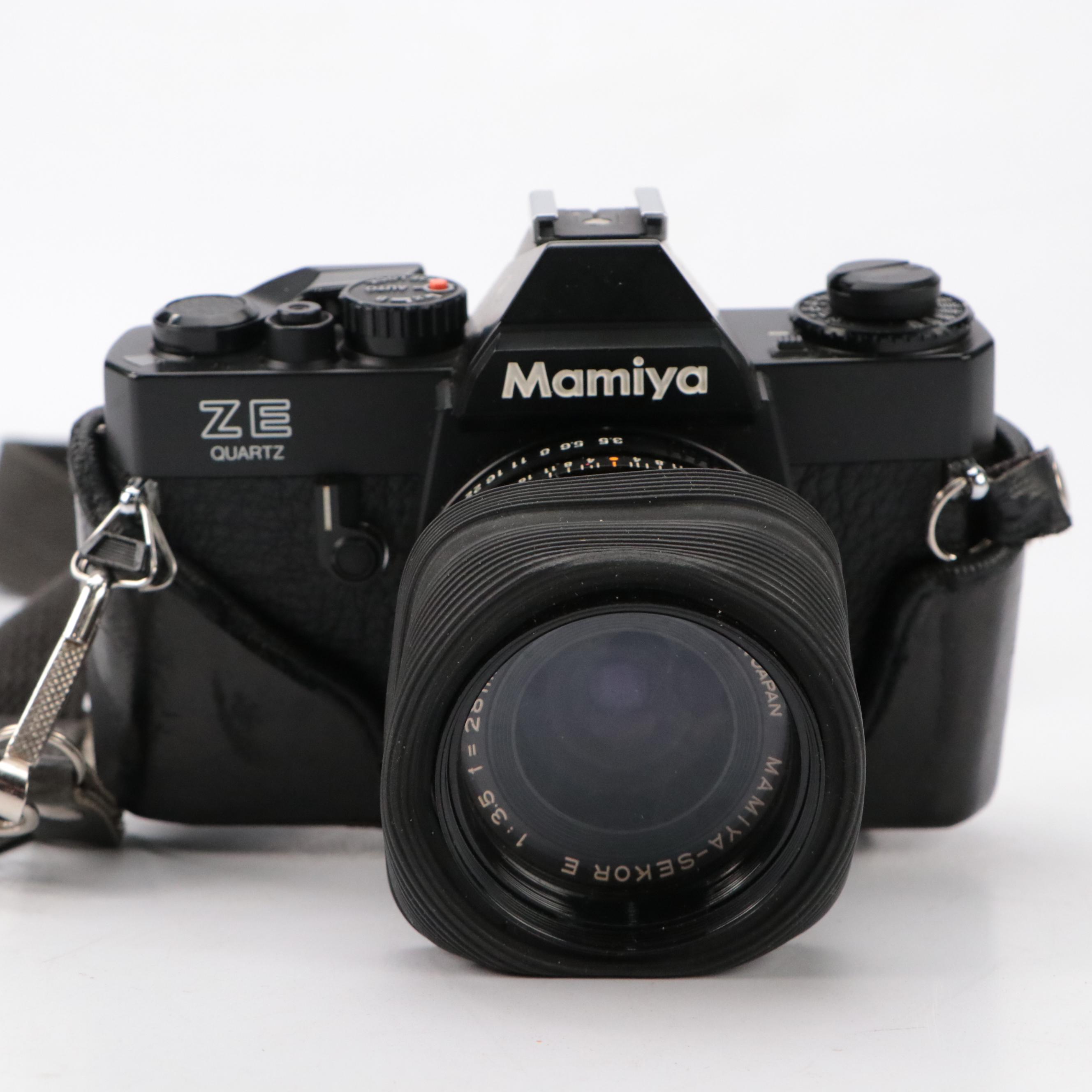 Mamiya ZE Quartz SLR Camera with Olympus Infinity SuperZoom 300 Camera