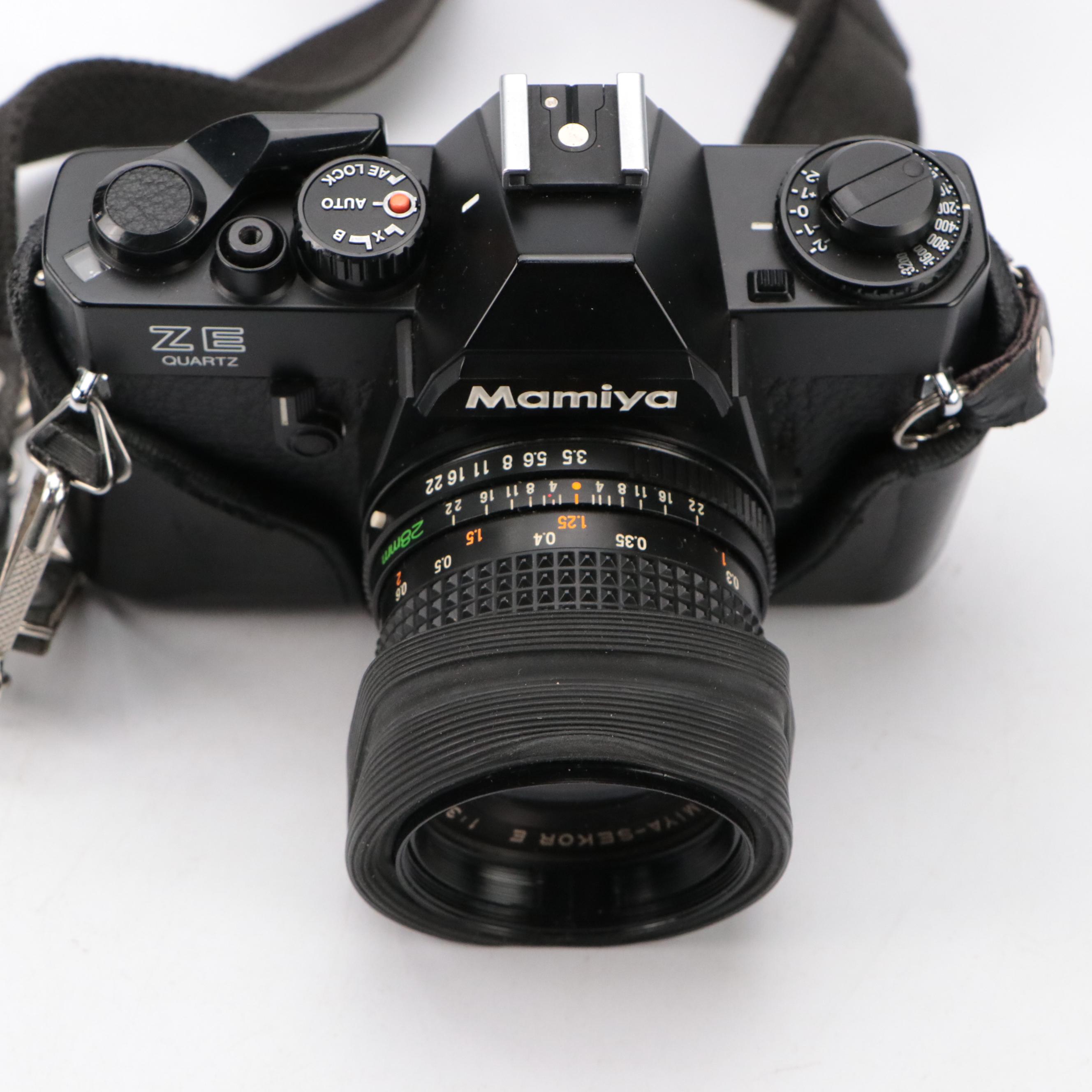 Mamiya ZE Quartz SLR Camera with Olympus Infinity SuperZoom 300 Camera
