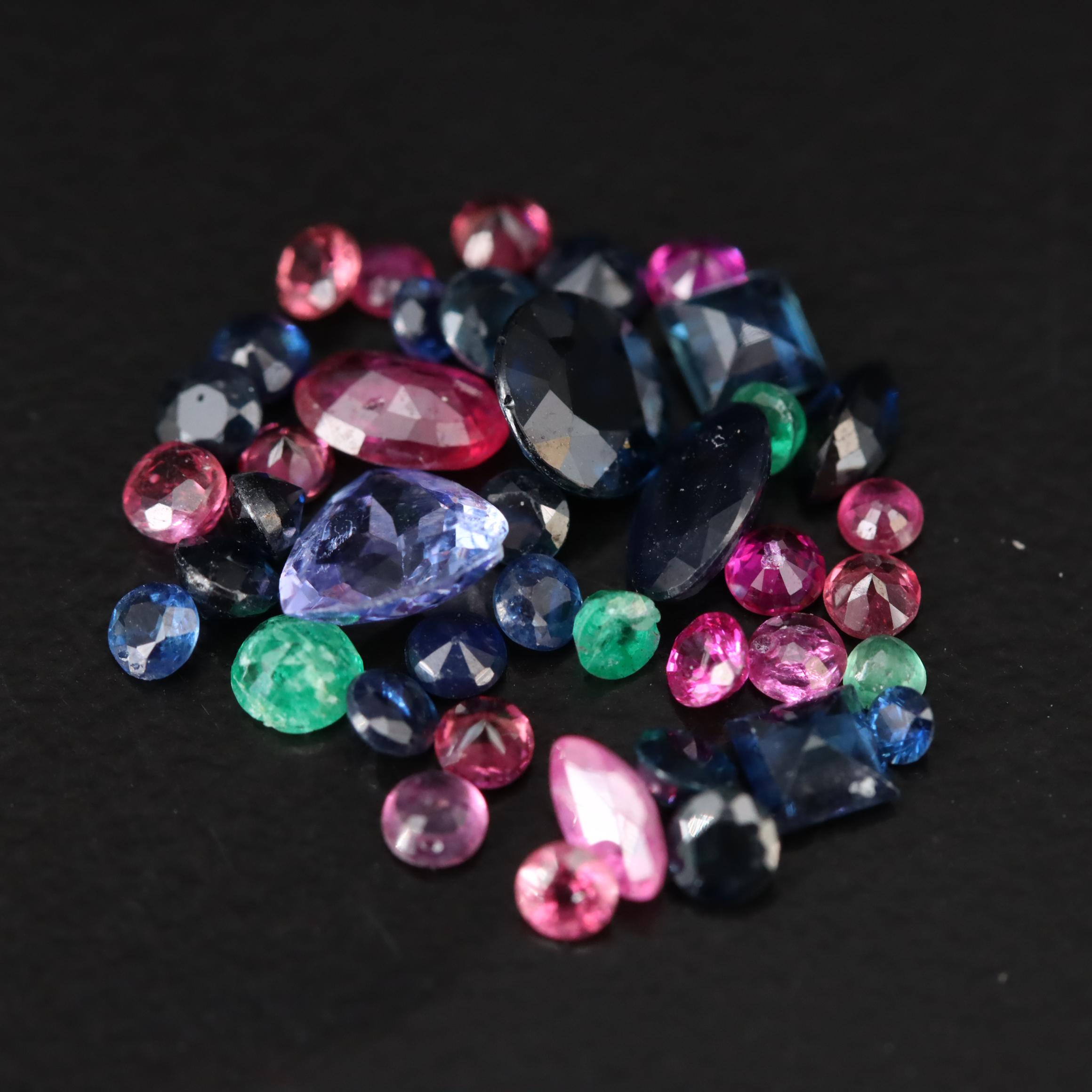 Loose 3.69 CTW Mixed Gemstones Including Emerald, Sapphire and Tanzanite