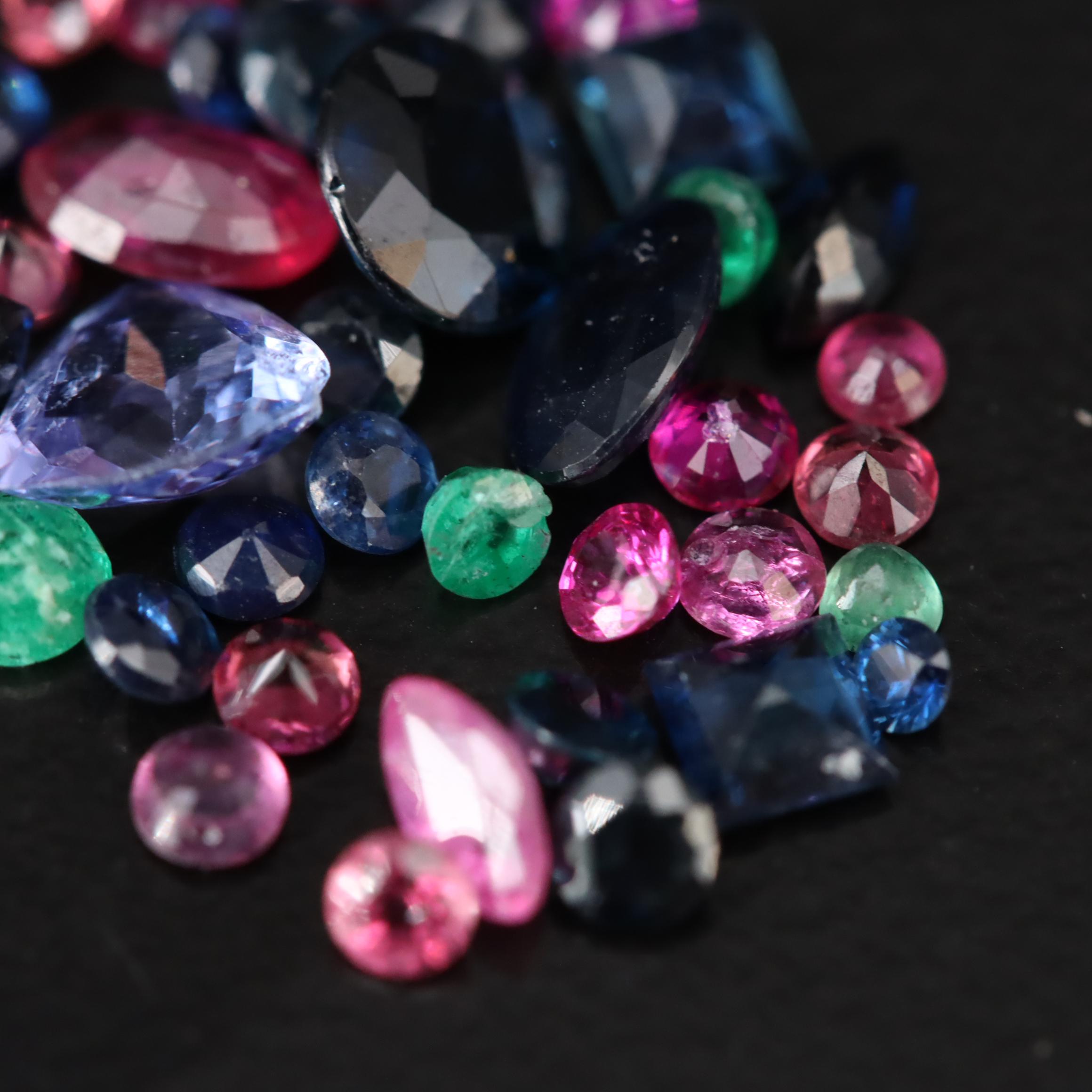 Loose 3.69 CTW Mixed Gemstones Including Emerald, Sapphire and Tanzanite