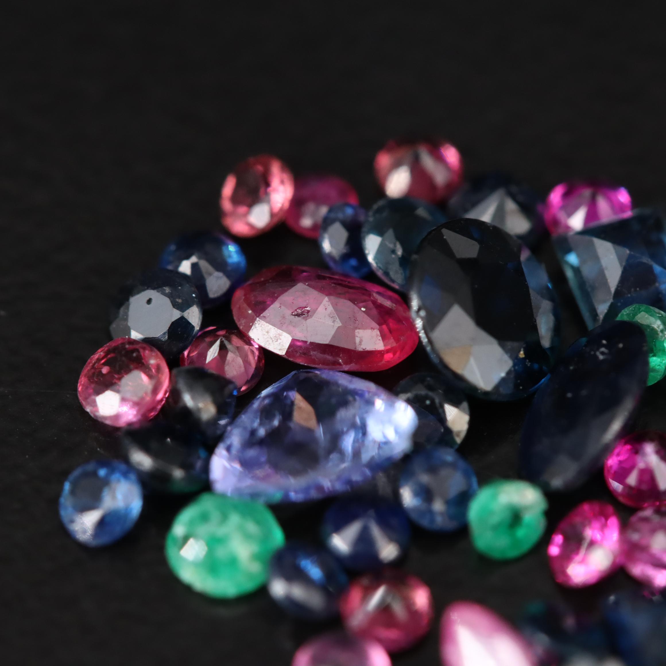 Loose 3.69 CTW Mixed Gemstones Including Emerald, Sapphire and Tanzanite