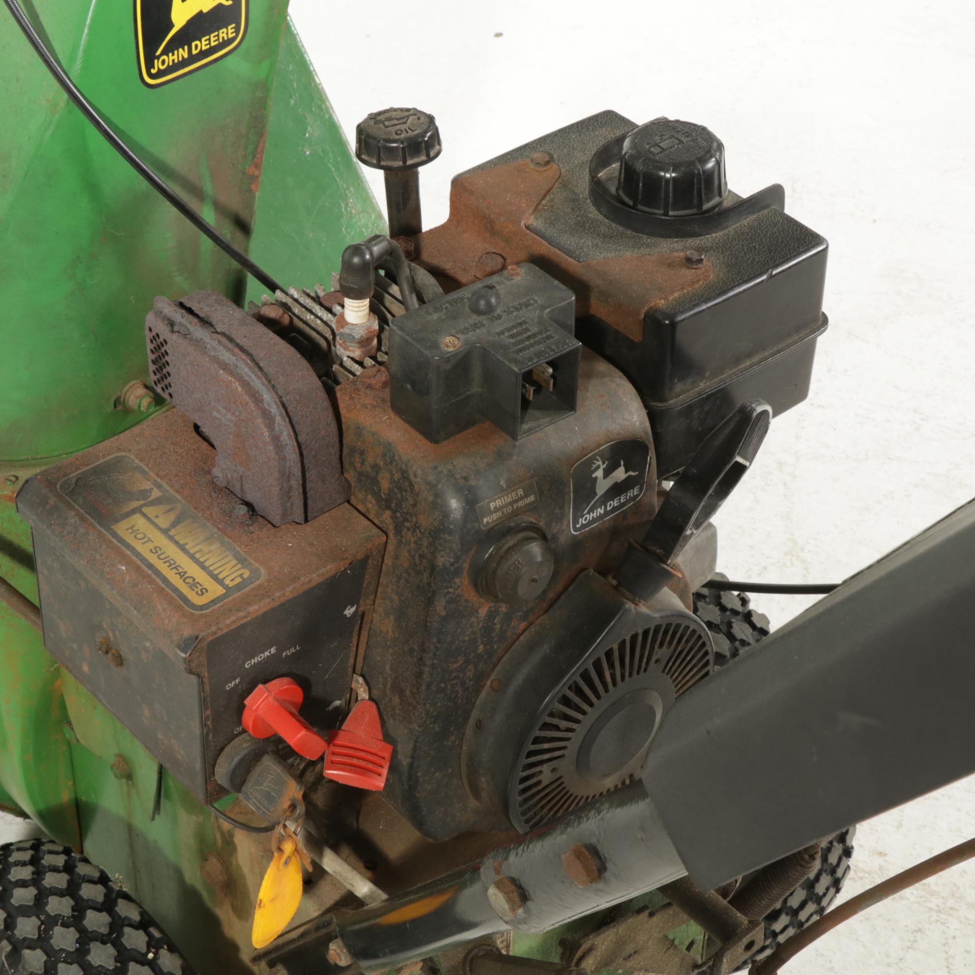 John Deere Model TRS24 Gas Powered Walk Behind Snow Blower