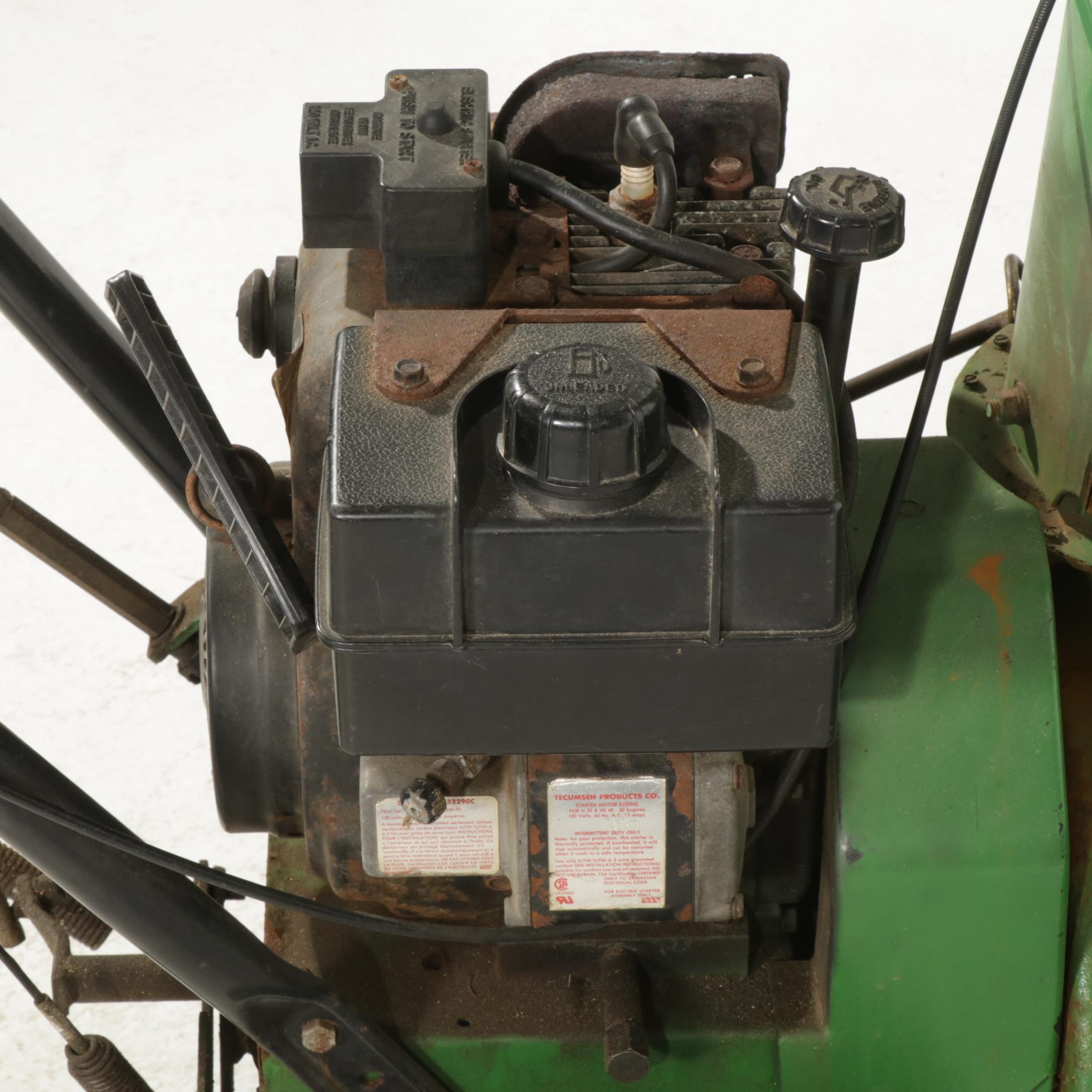 John Deere Model TRS24 Gas Powered Walk Behind Snow Blower