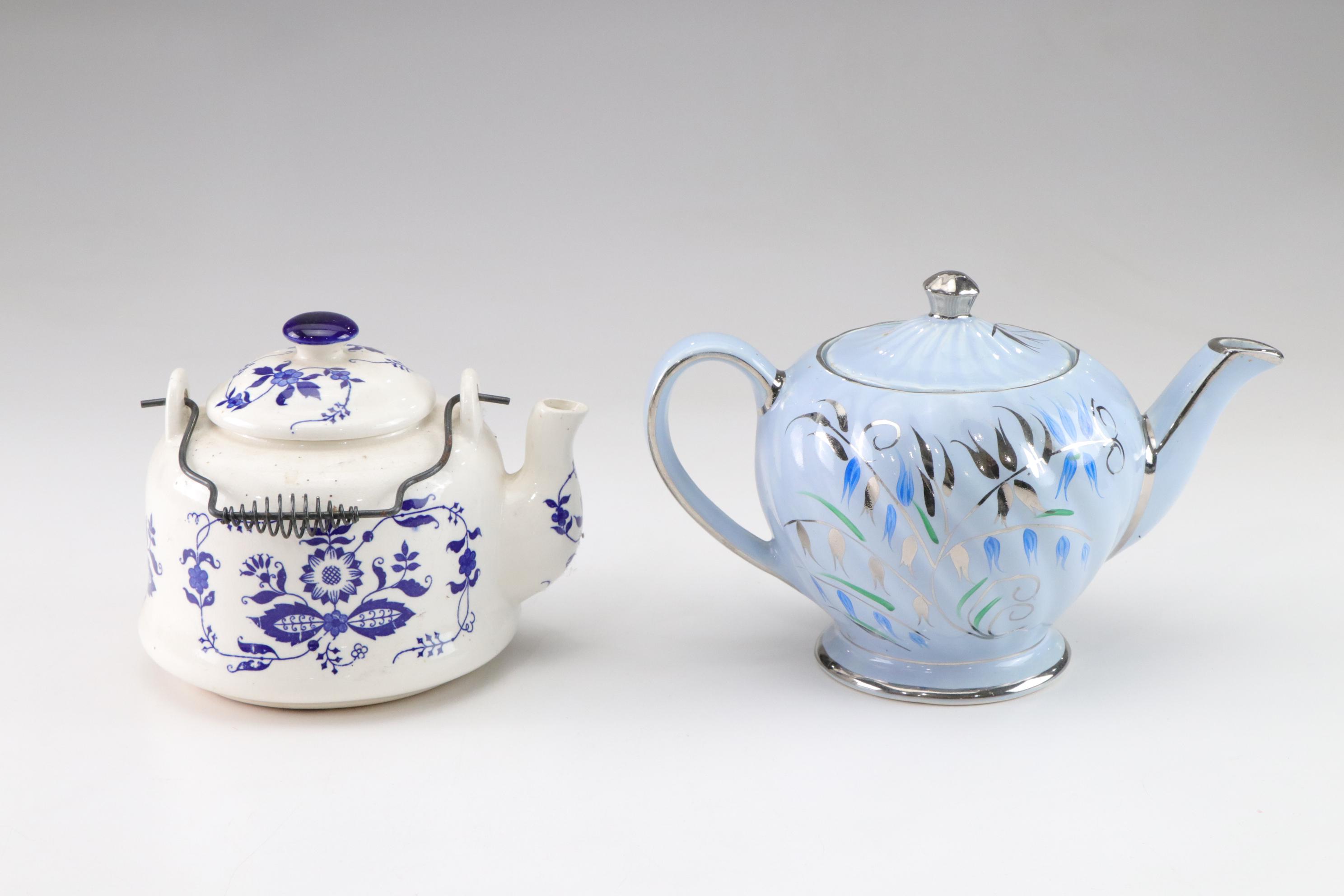 Sadler Light Blue Ceramic Teapot with Chrome Accents with Three Other Teapots