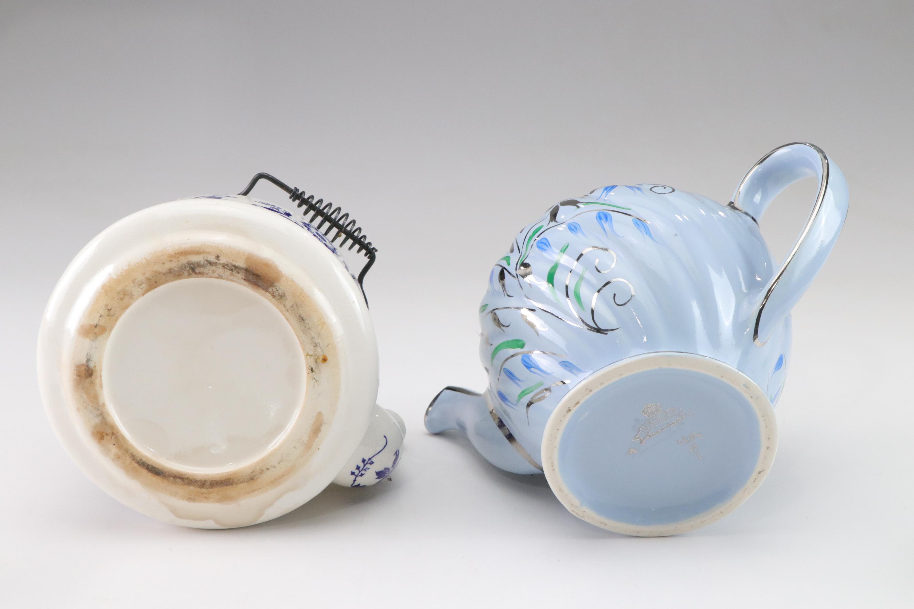 Sadler Light Blue Ceramic Teapot with Chrome Accents with Three Other Teapots