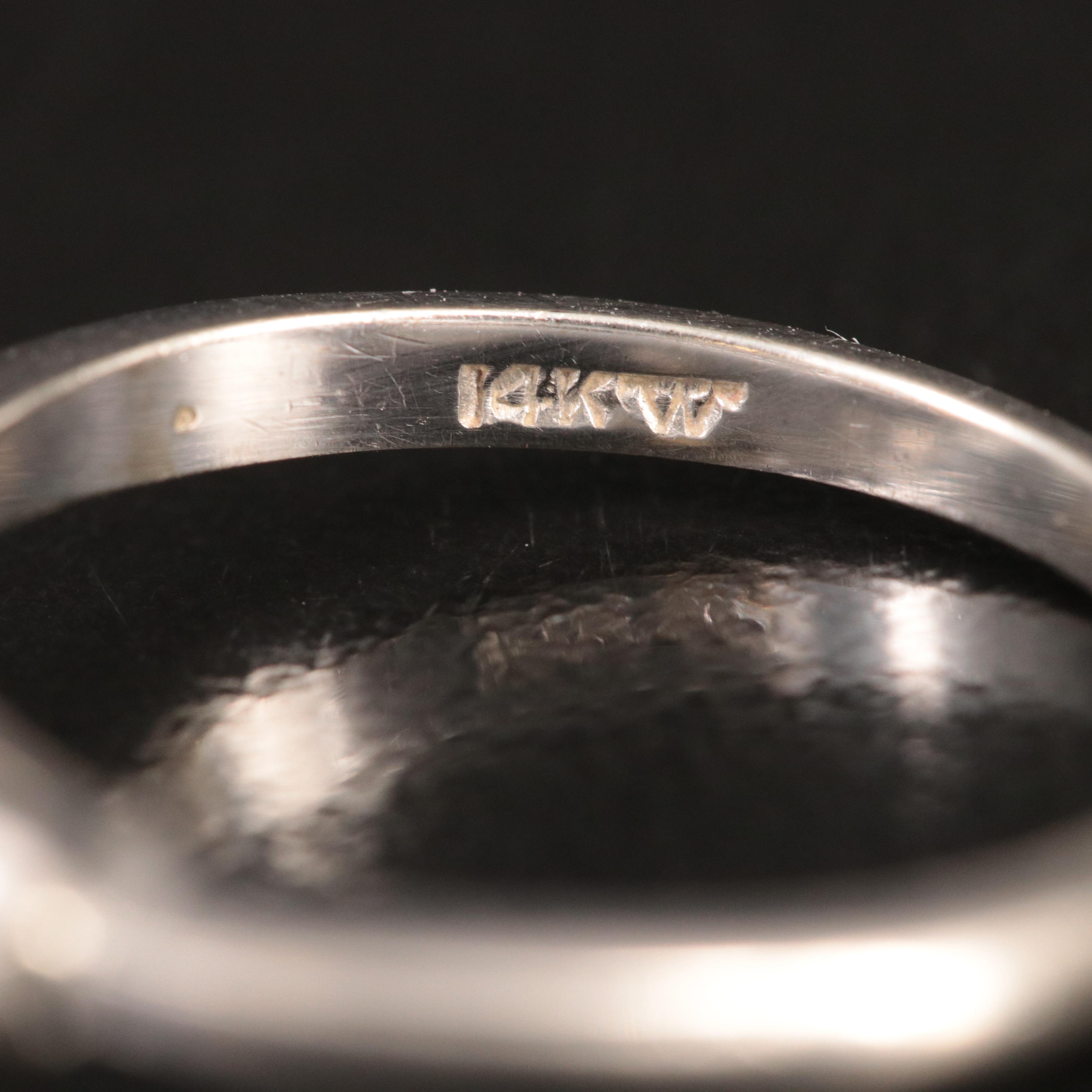 14K Strontium Titanate and White Spinel Ring