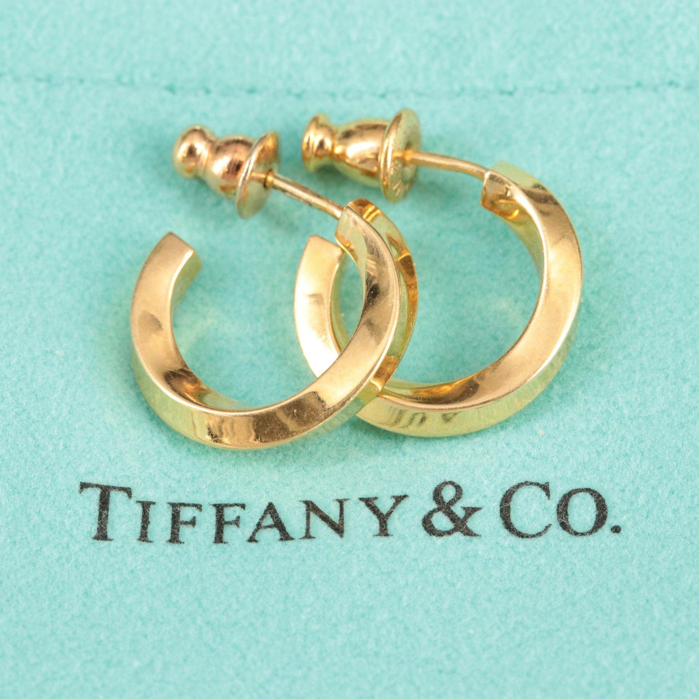 Tifffany & Co. 18K Twist Hoop Earrings | EBTH