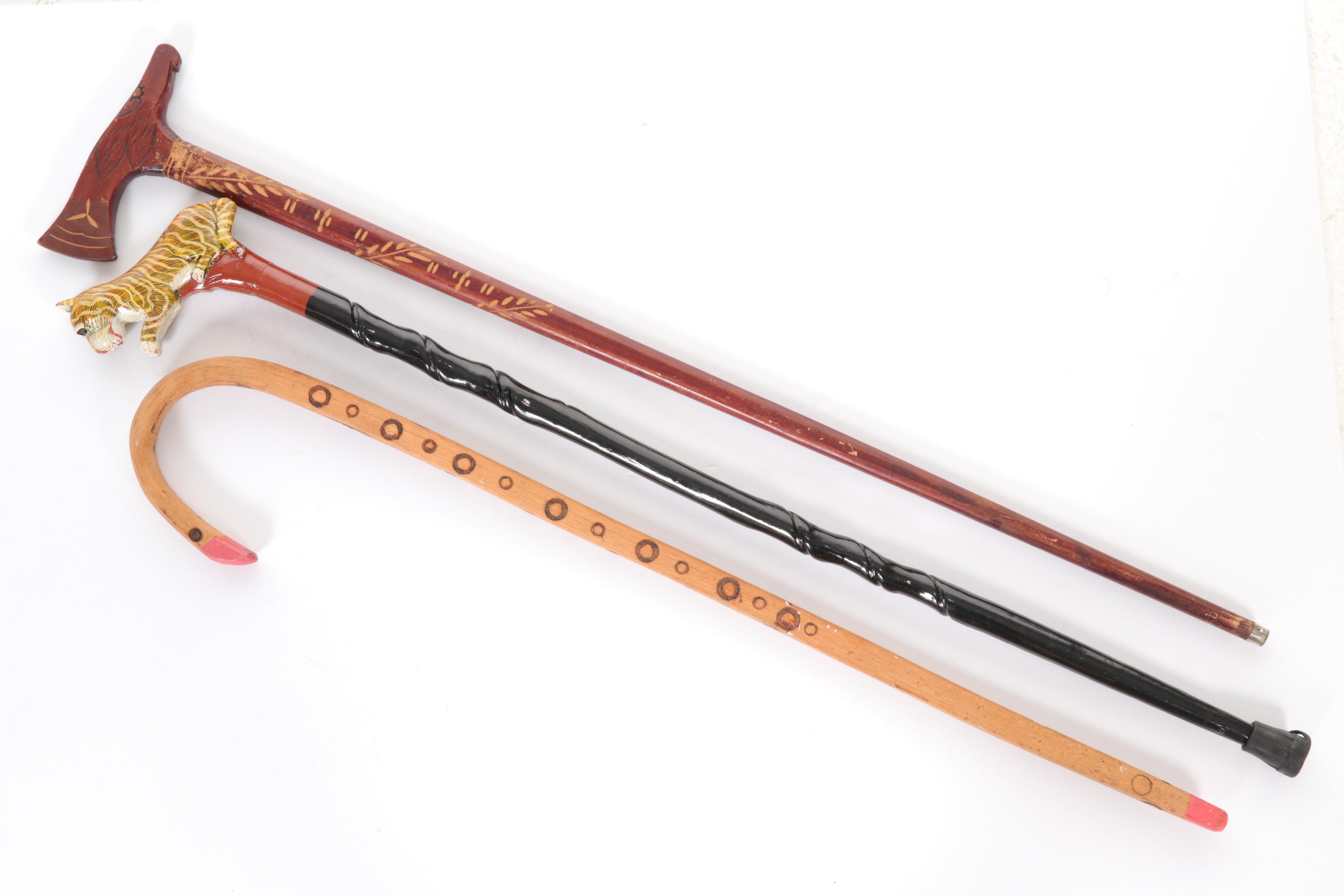 Hand Carved Wooden Canes with Flamingo, Tiger, and Eagle Heads