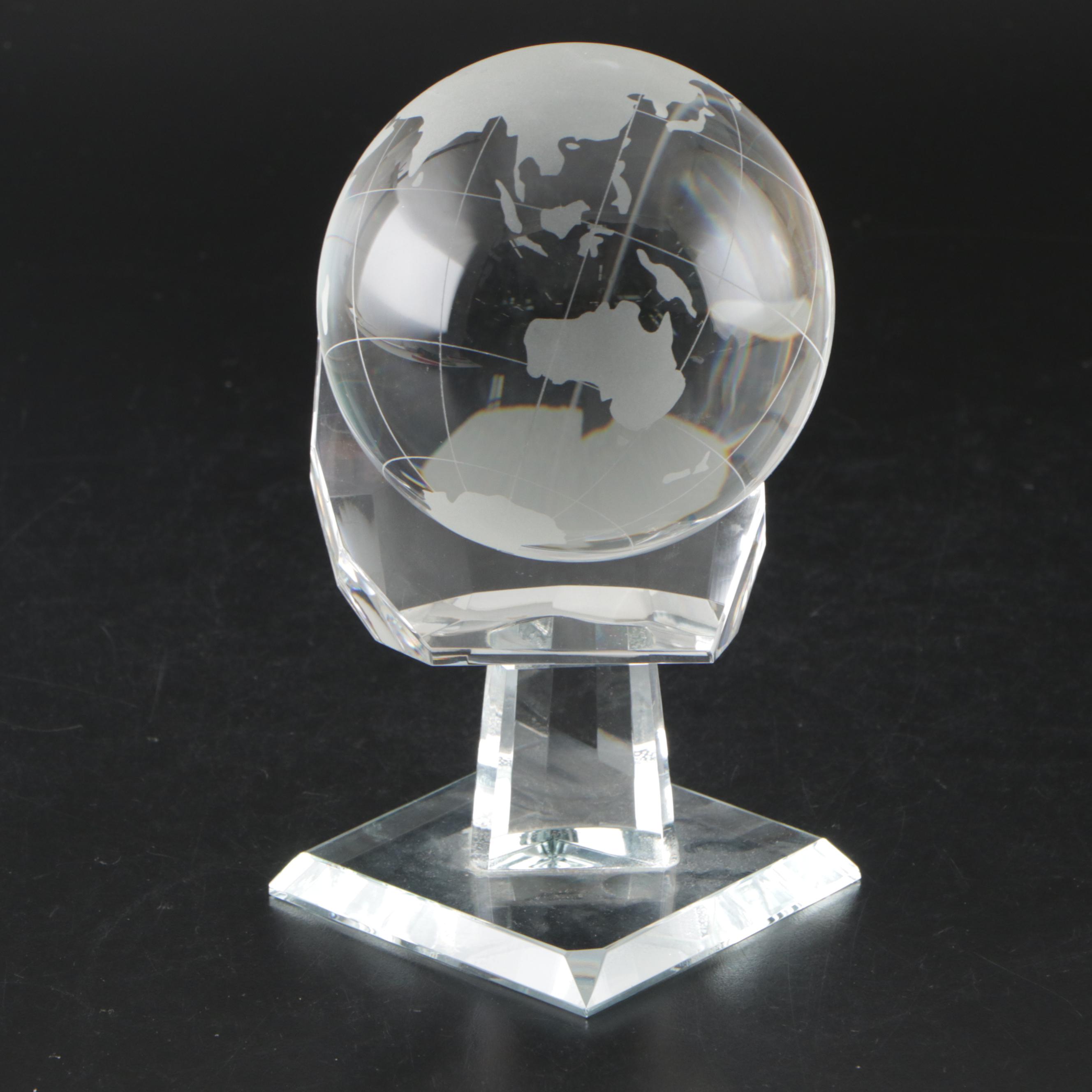 Etched Glass Revolving Globe on Hand