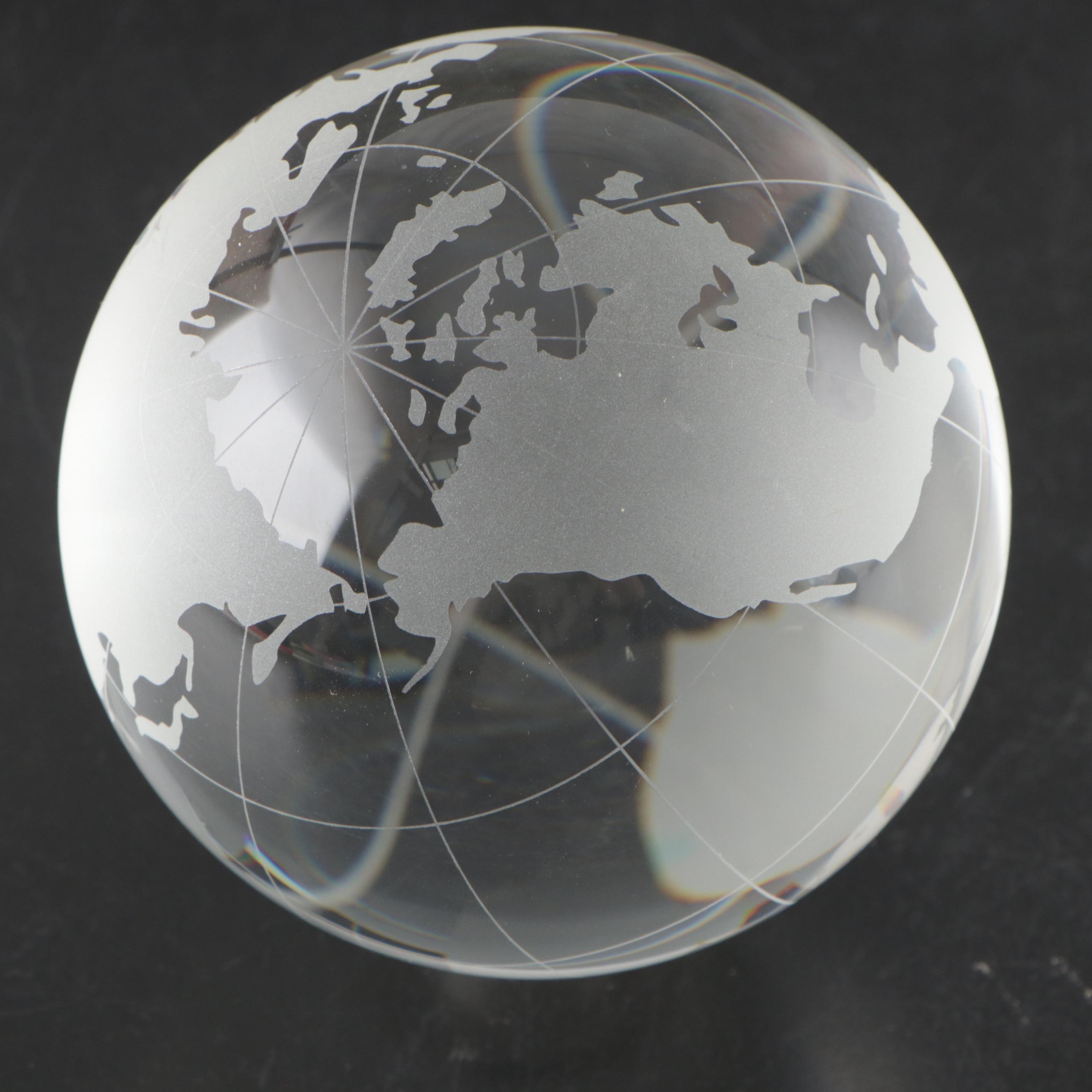 Etched Glass Revolving Globe on Hand