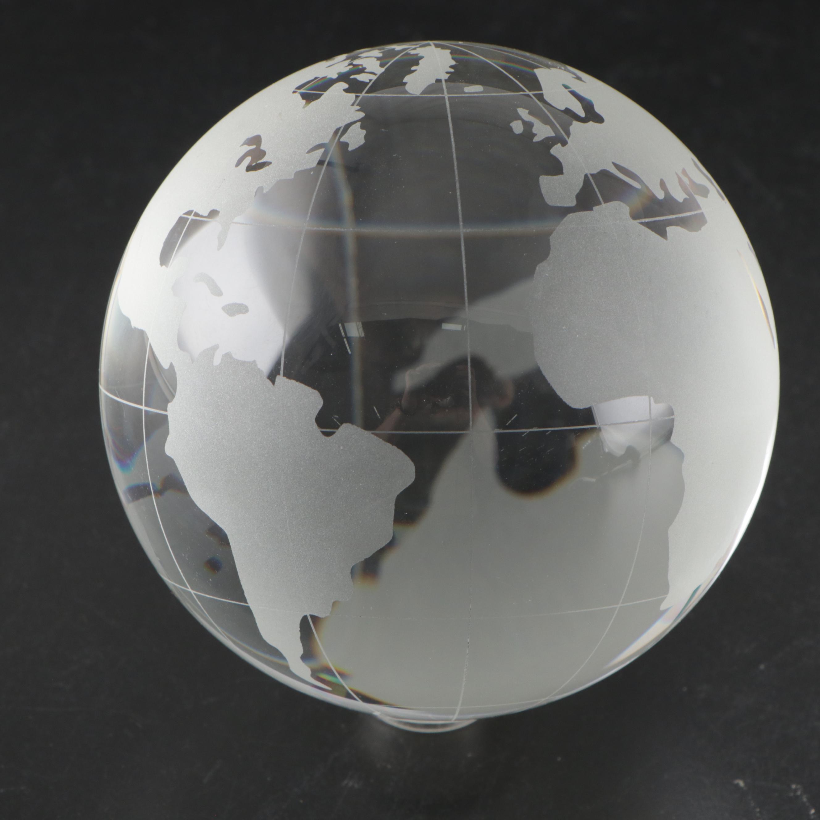 Etched Glass Revolving Globe on Hand