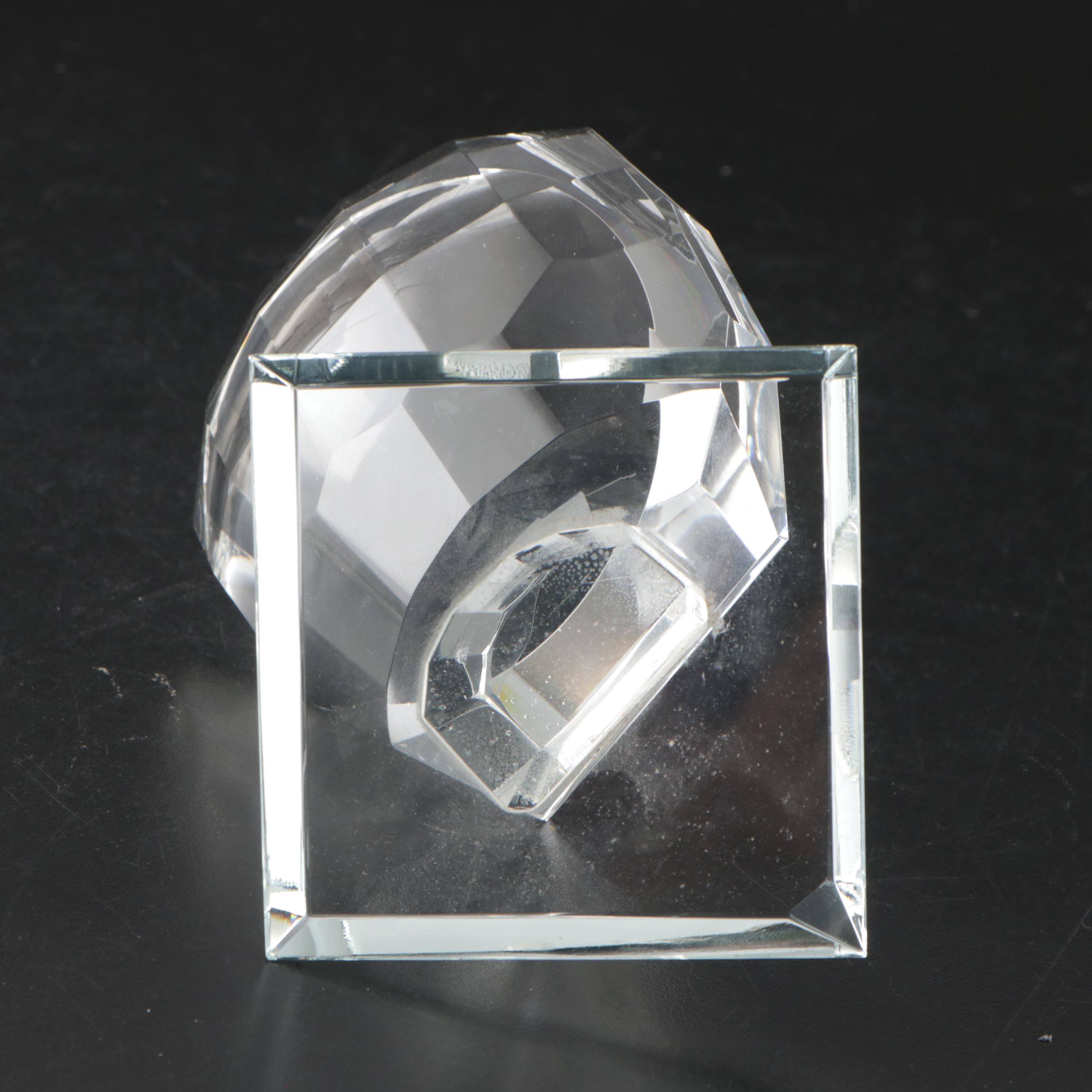 Etched Glass Revolving Globe on Hand