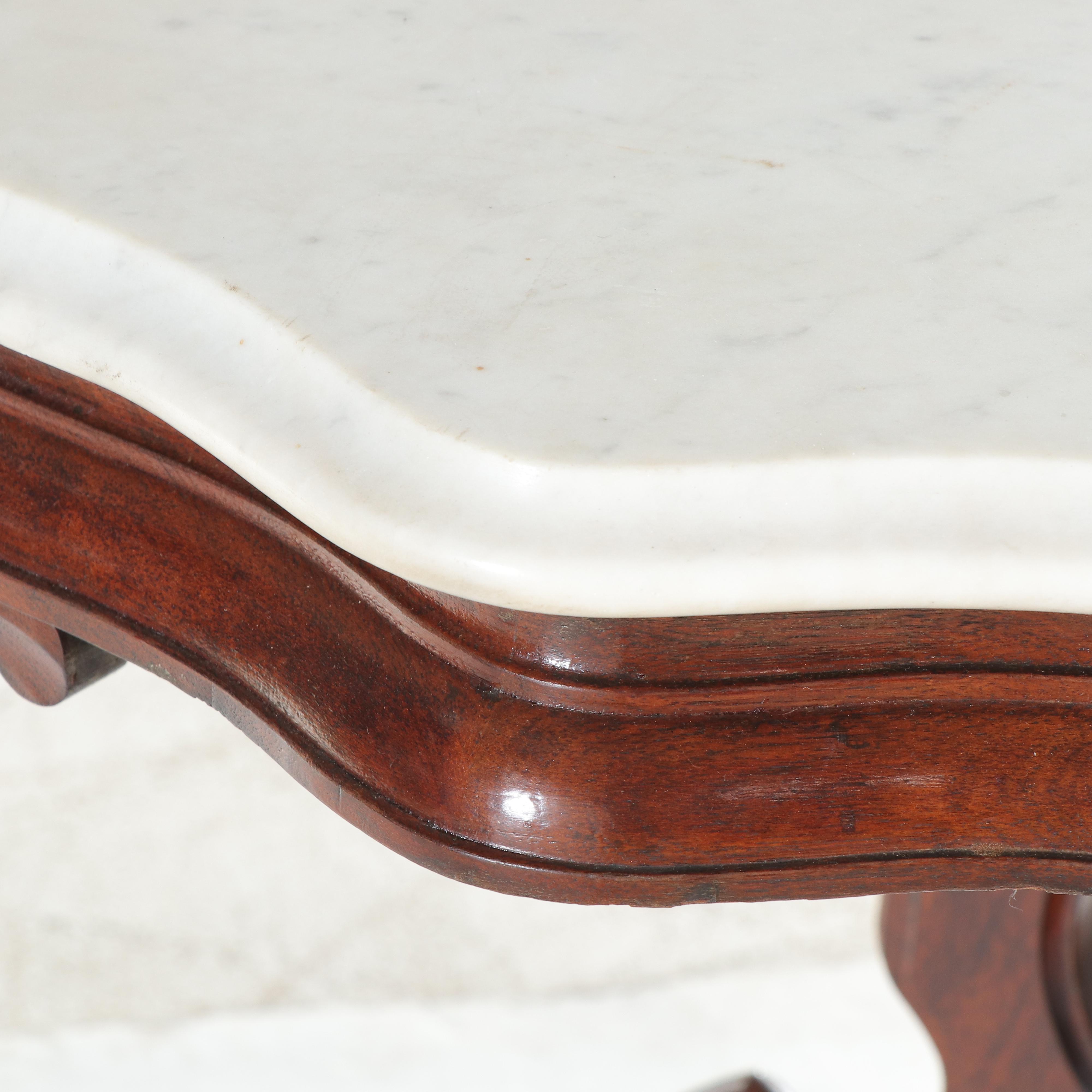 Victorian Rococo Revival Carved Walnut and White Marble Parlor Table, circa 1870