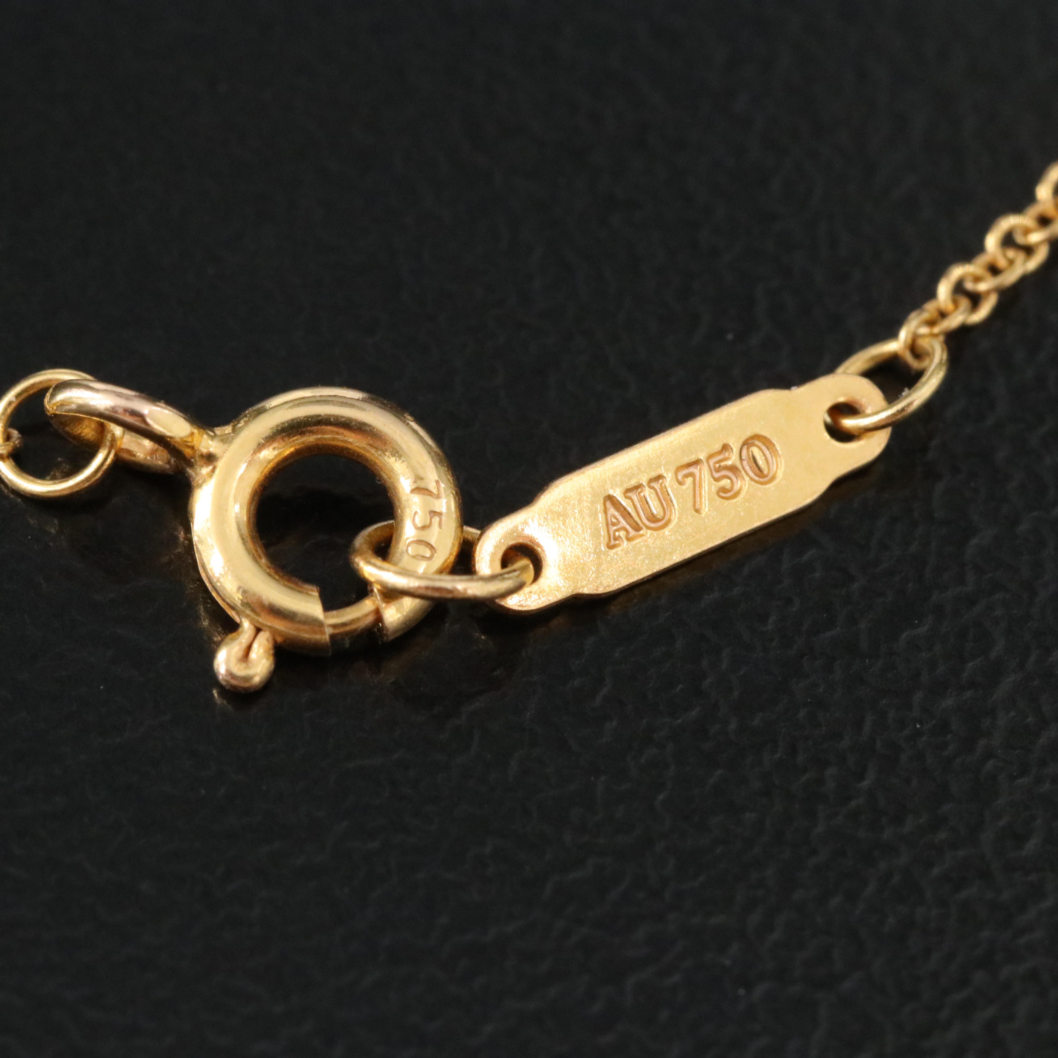 Tiffany & Co. Atlas 18K Gold Circle Pendant Necklace with Diamond Accents