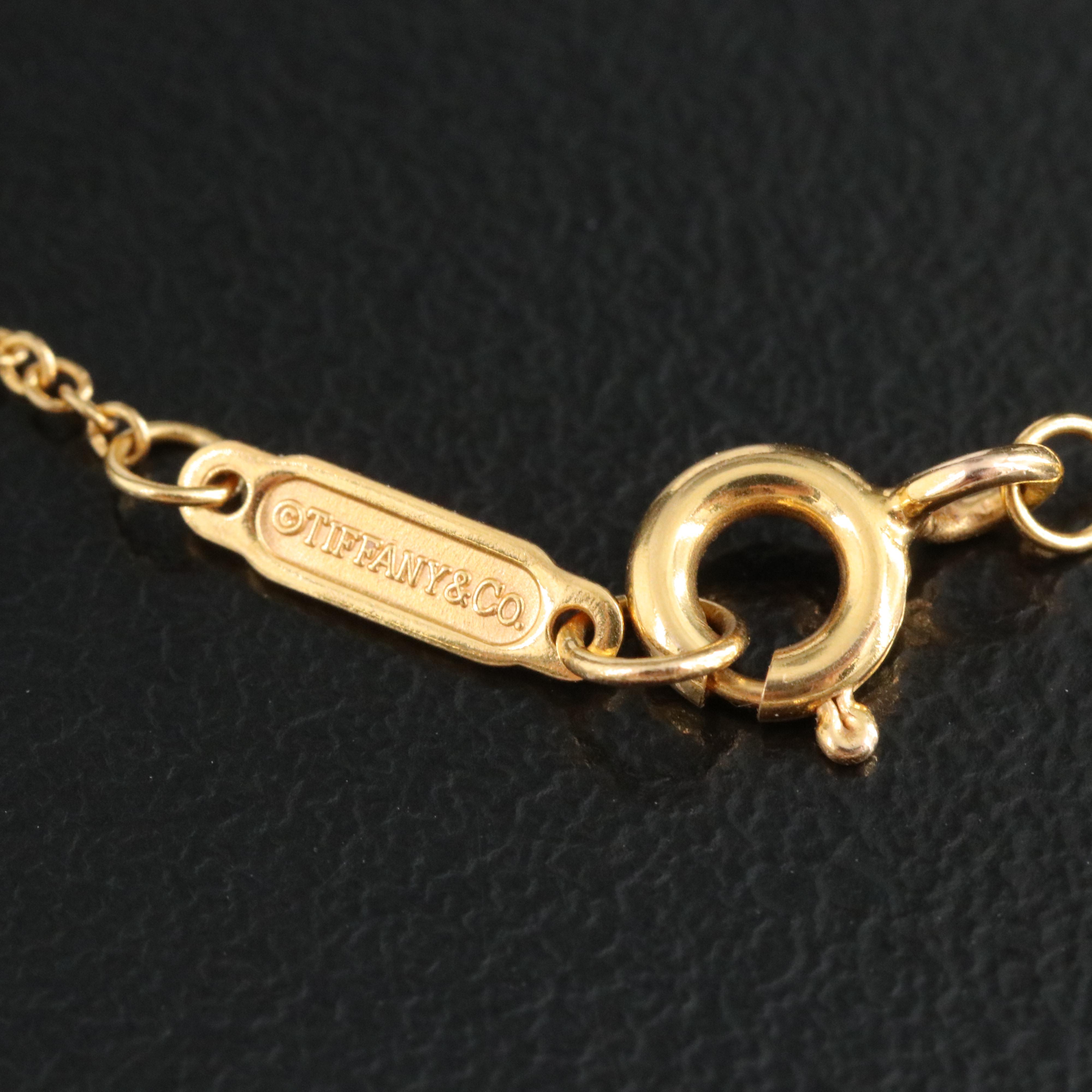 Tiffany & Co. Atlas 18K Gold Circle Pendant Necklace with Diamond Accents