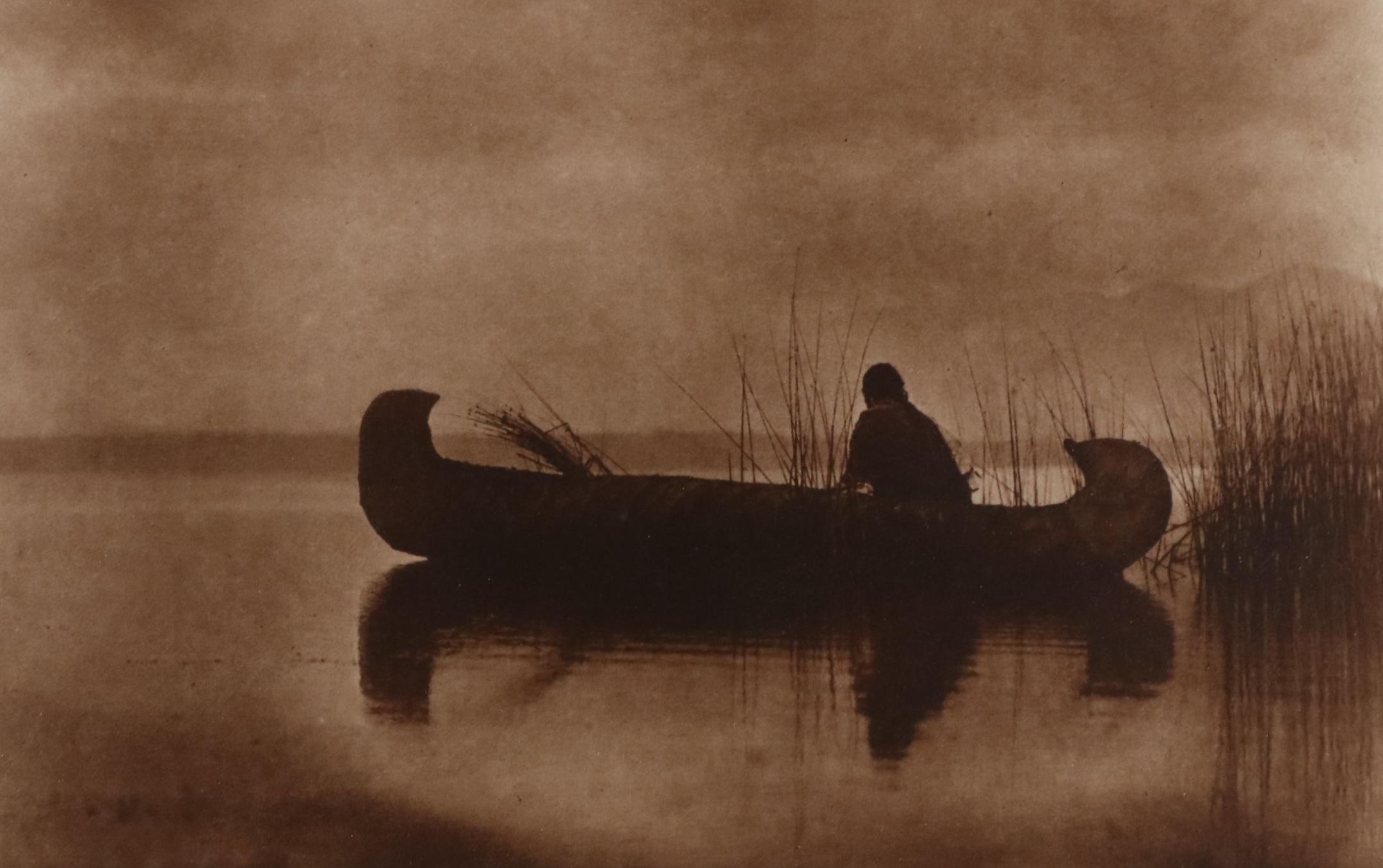 Photographic Print After Edward S. Curtis "Kutenai Duck Hunter"